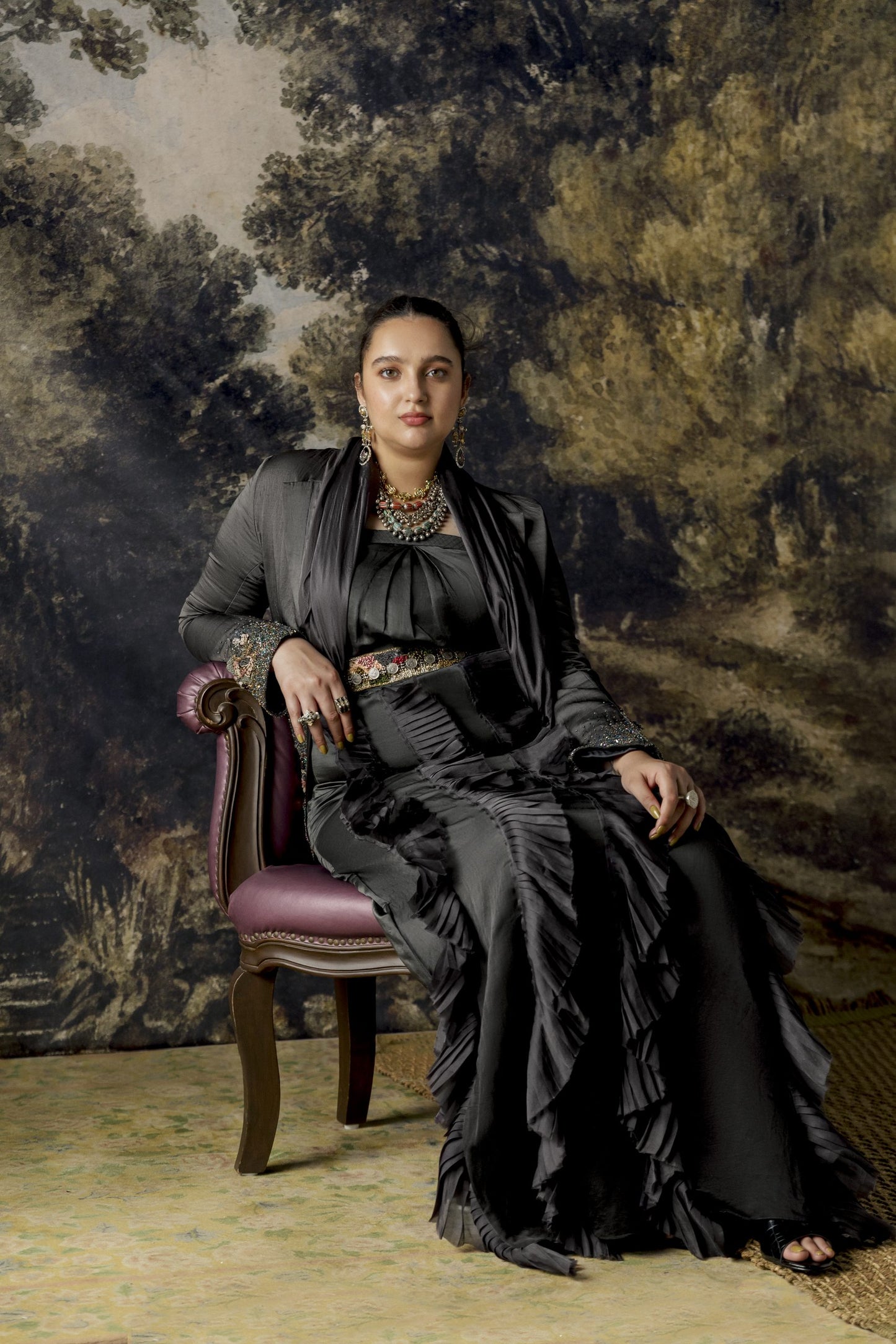 Kina Balu Draped Collar Gown with pleated frills and intricate hand-beading, paired with a stylish embroidered jacket