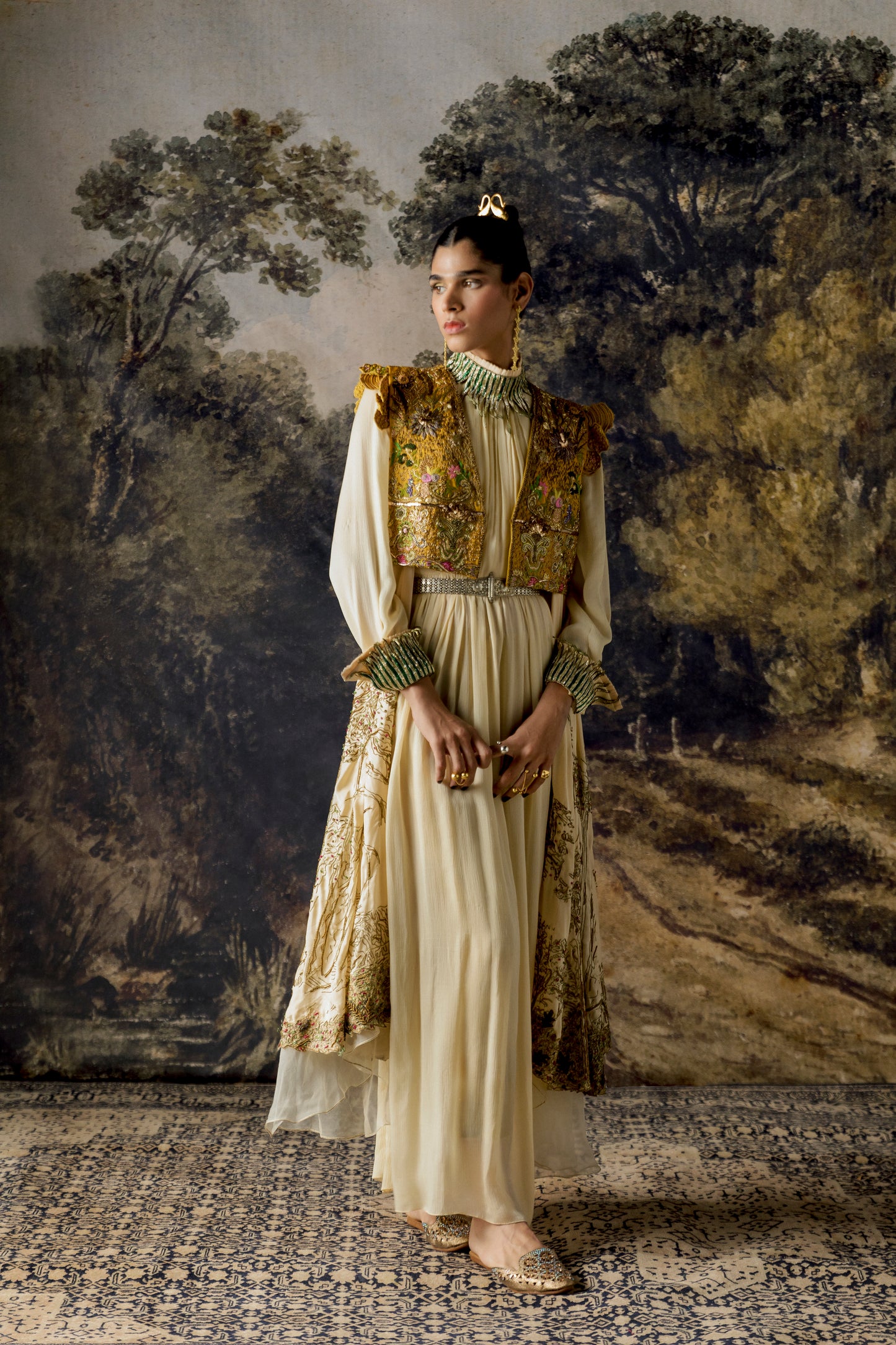 Rumi Gown with cape and cropped jacket featuring metallic embroidery and rich handwork textures for a stunning look