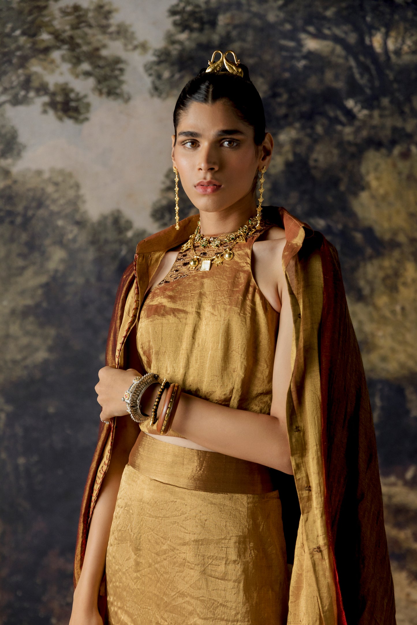 Model wearing the Exquisite Lehenga Set with stylish shirt, modern blouse, skirt, and luxurious Zari Pashmina stole, radiating elegance