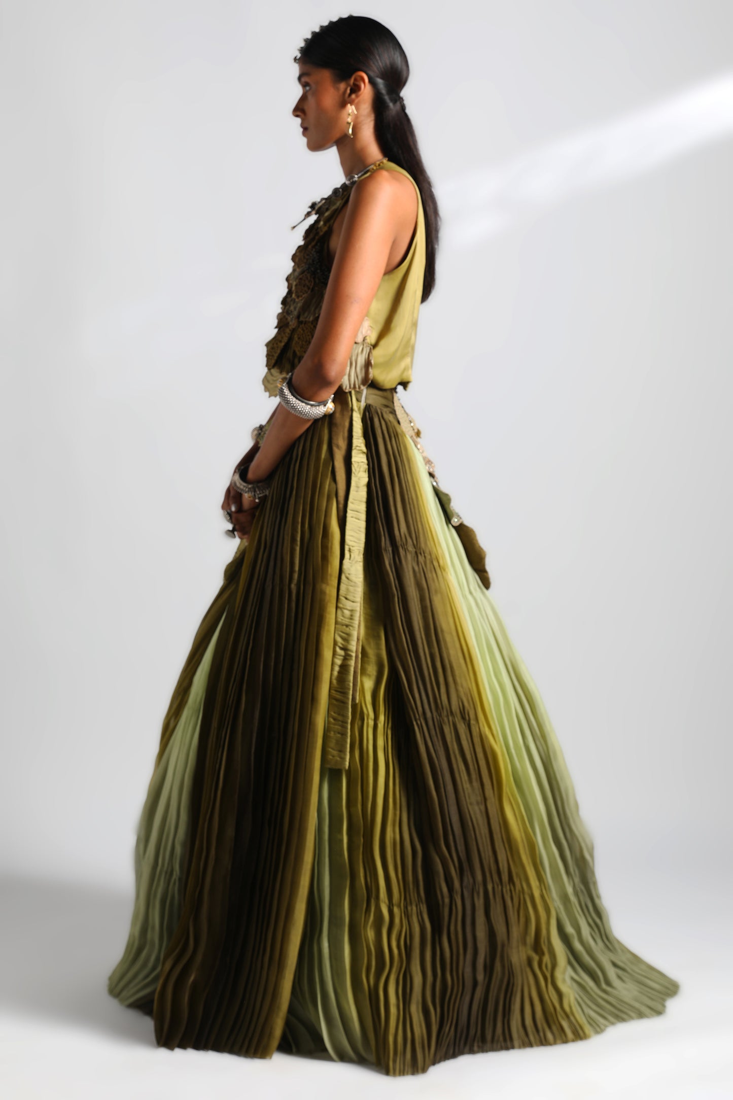 Side view of the lehenga set showcasing the dual-hued pleats