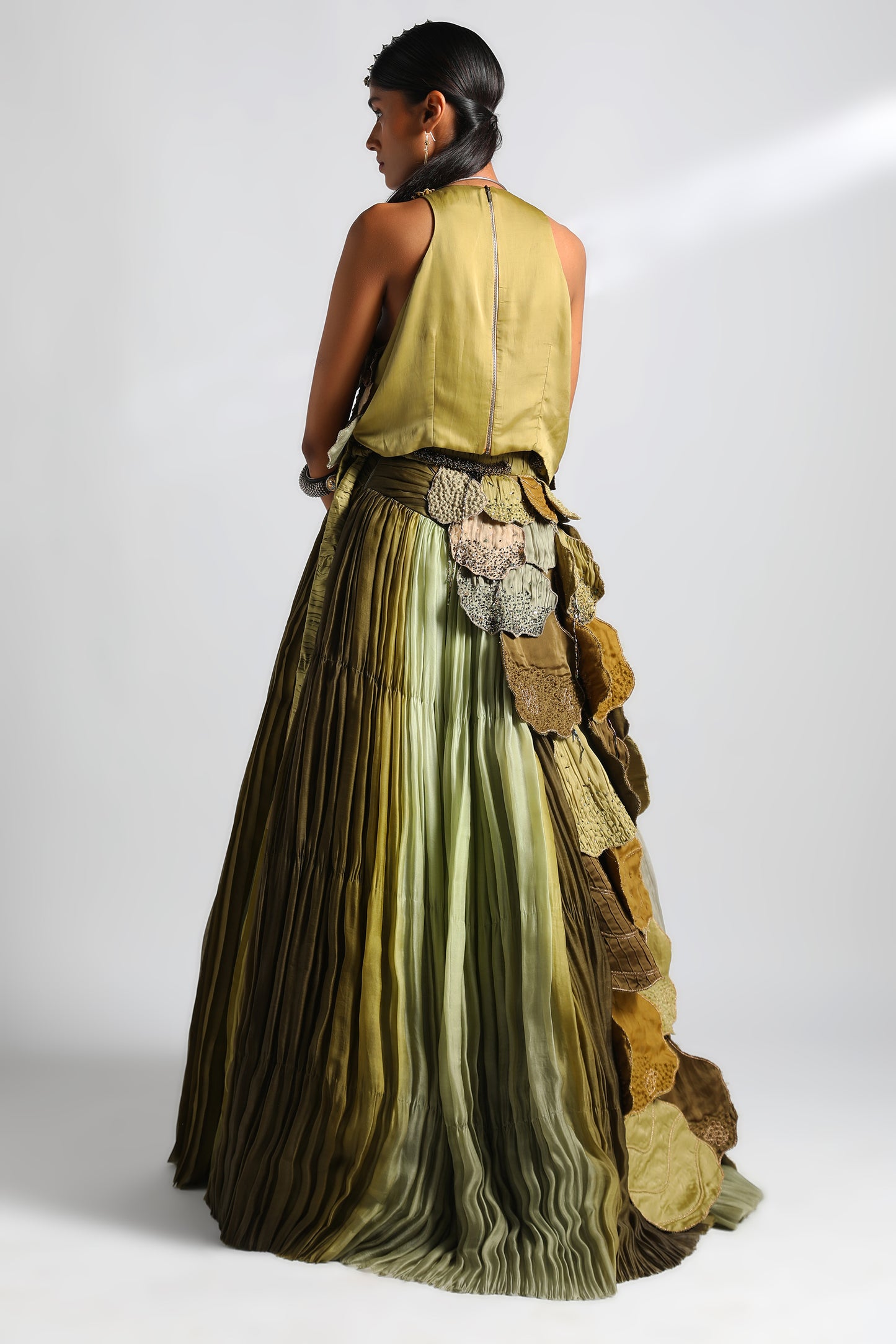 Back view of the designer blouse and lehenga set with detailed embroidery