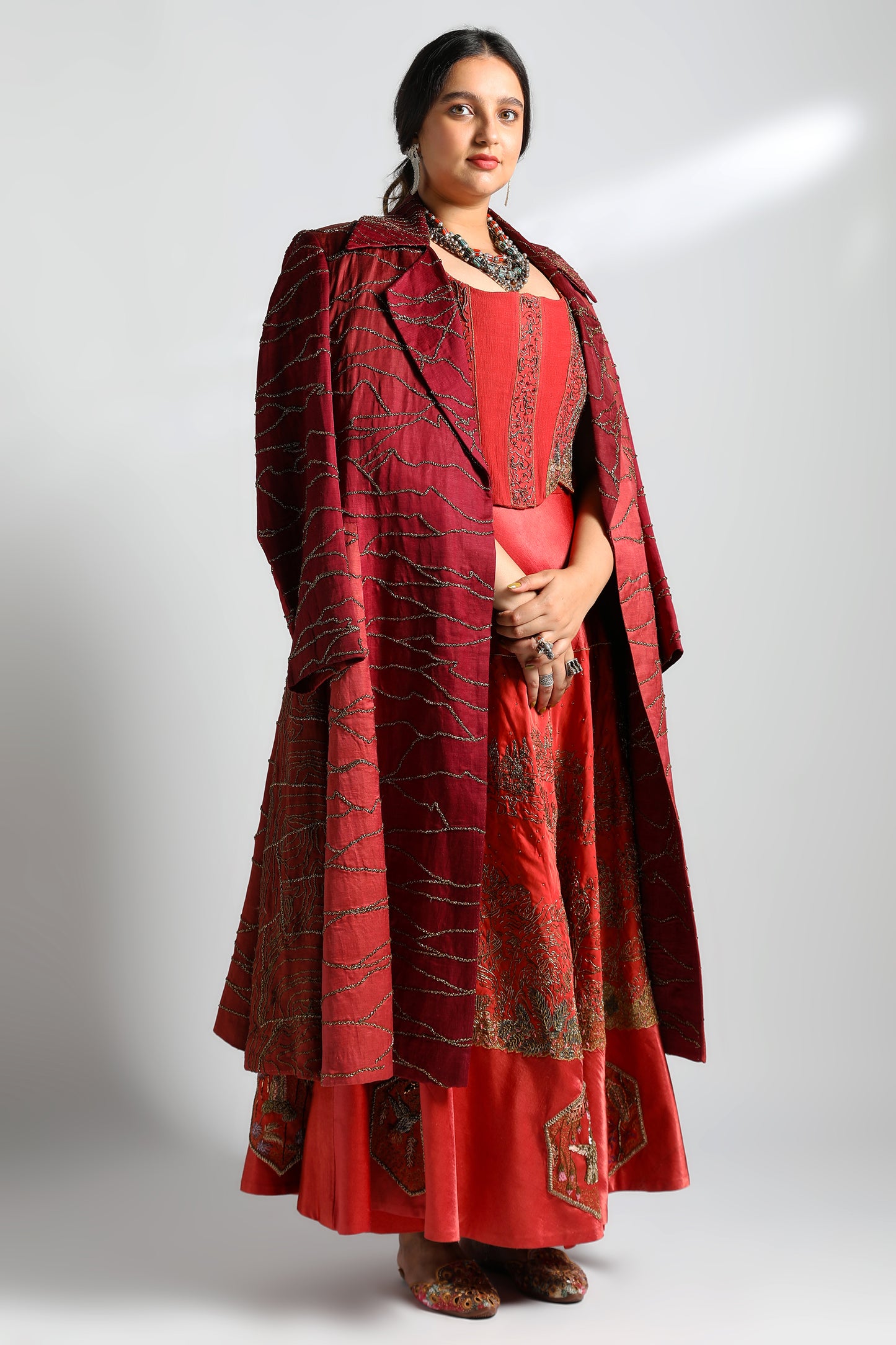 Full view of the Namib lehenga set with designer coat, showcasing elegant 3D embroidery and zardosi work