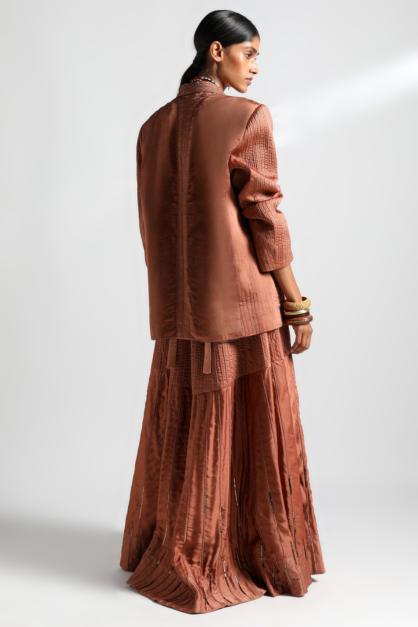 Back view of the Jaisalmer Lehenga Set highlighting the design and fit of the corset
