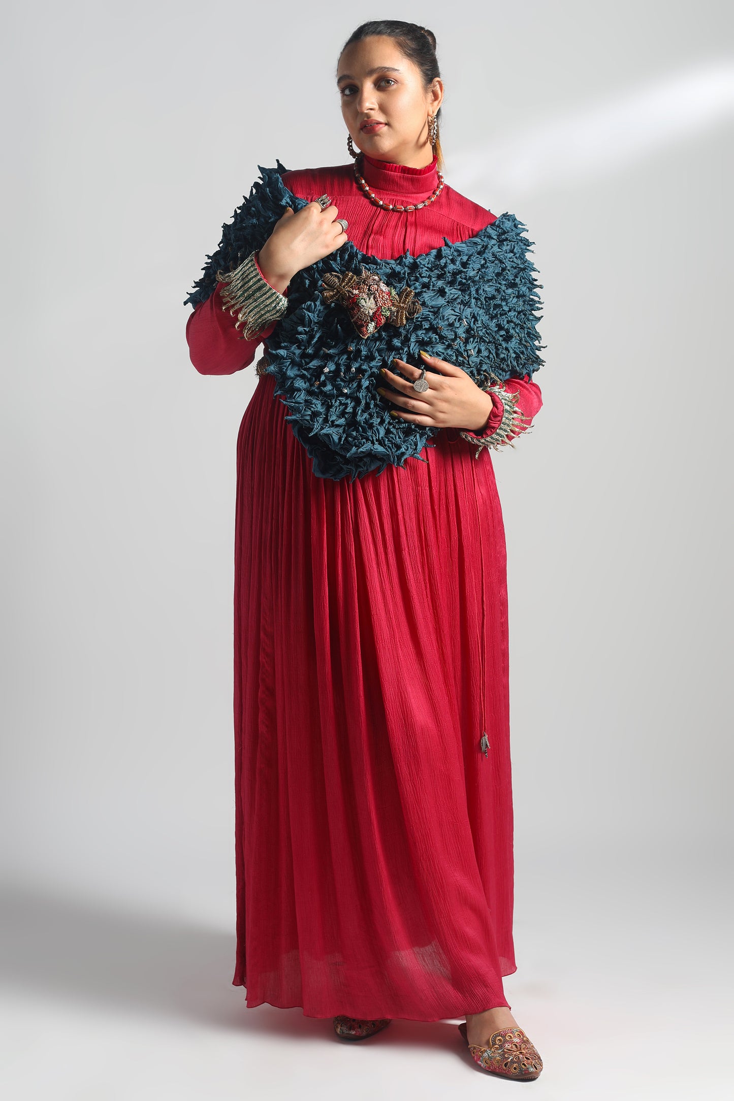 Rumi Pink Gown with metallic embroidery paired with an Ocean Stole and brooch for an elegant look