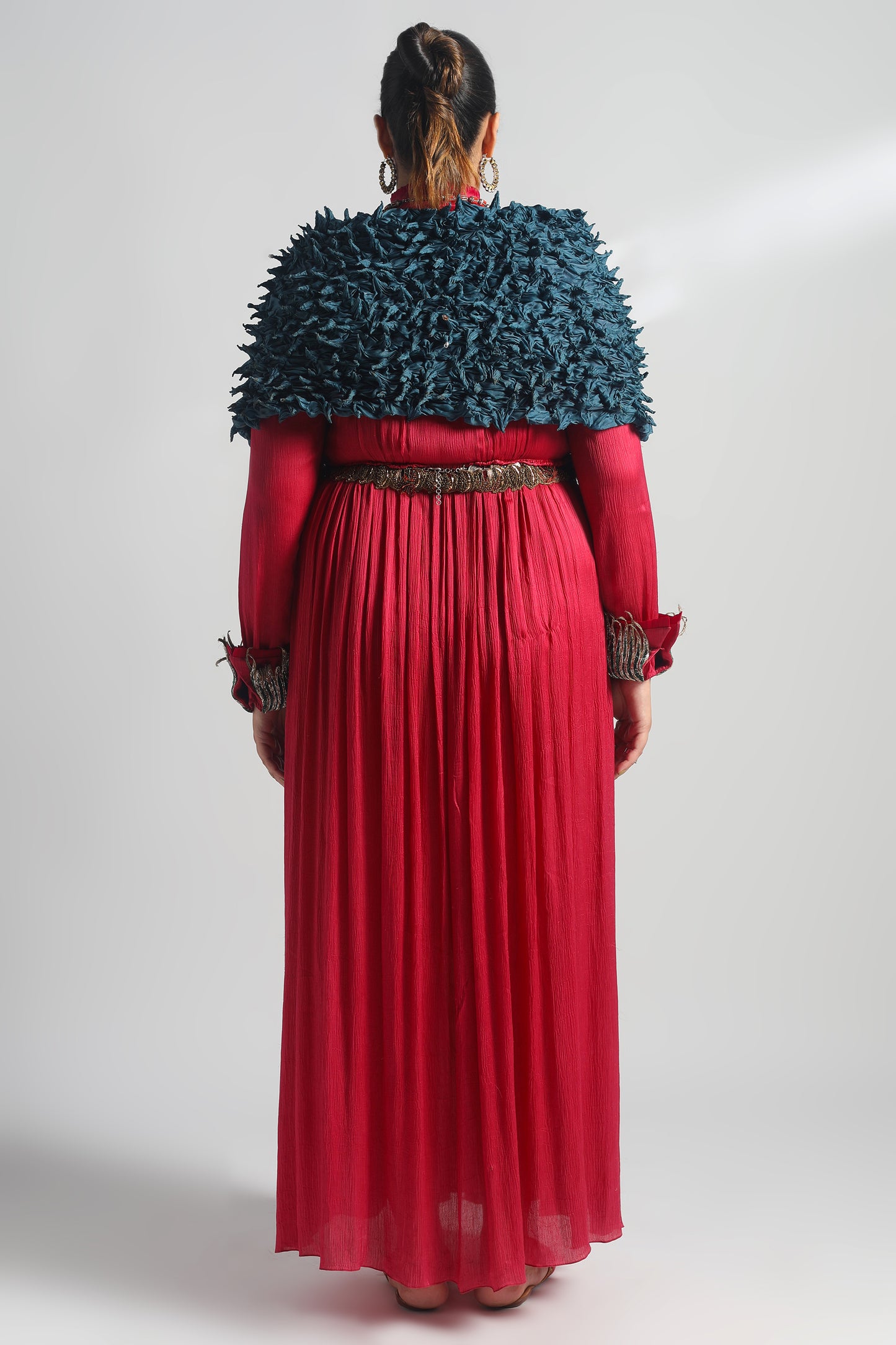 Back view of the Rumi Pink Gown paired with the Ocean Stole, focusing on the gown’s flowing silhouette