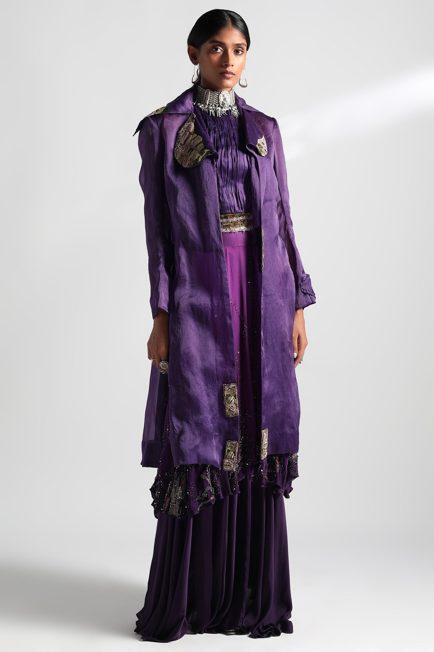 Purple carpet jacket for women featuring 3D hand embroidery and fine tailoring, offering an elegant and stylish long coat design