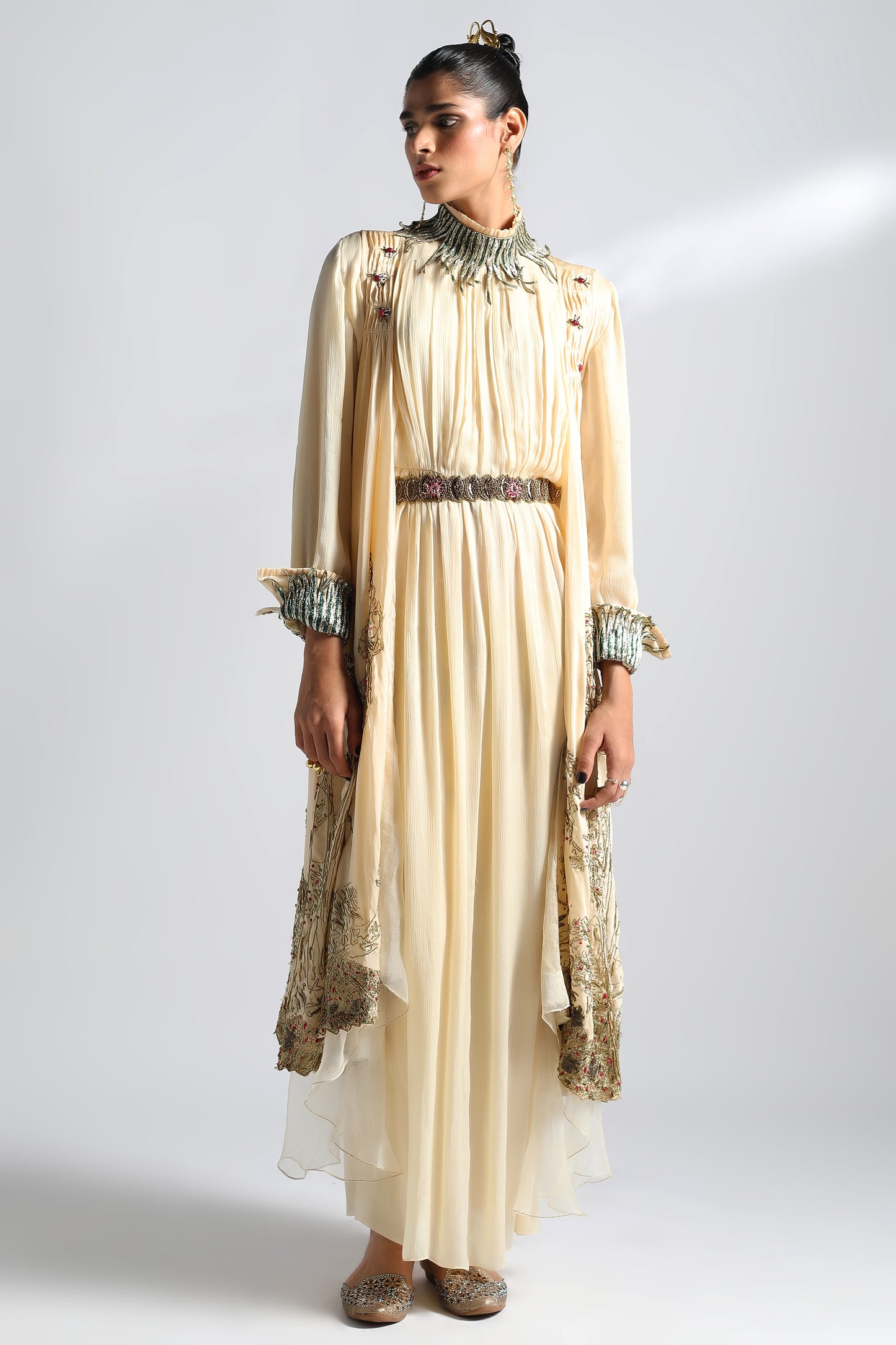 Rumi Gown with cape featuring dual-tone metallic embroidery and lush hand-embroidered textures for an elegant look