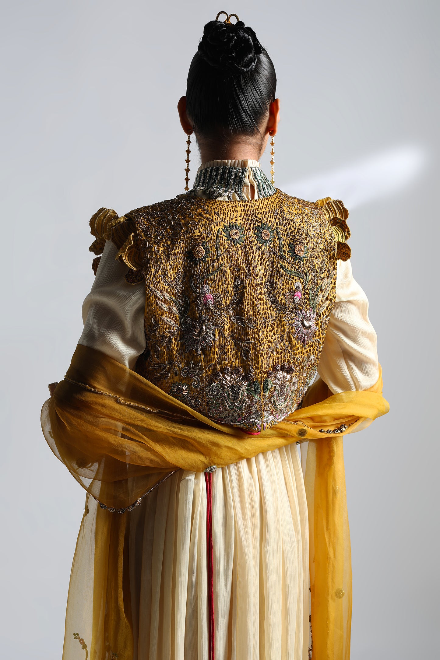 Back view of the cropped jacket with dupatta, showing intricate handwork and design details