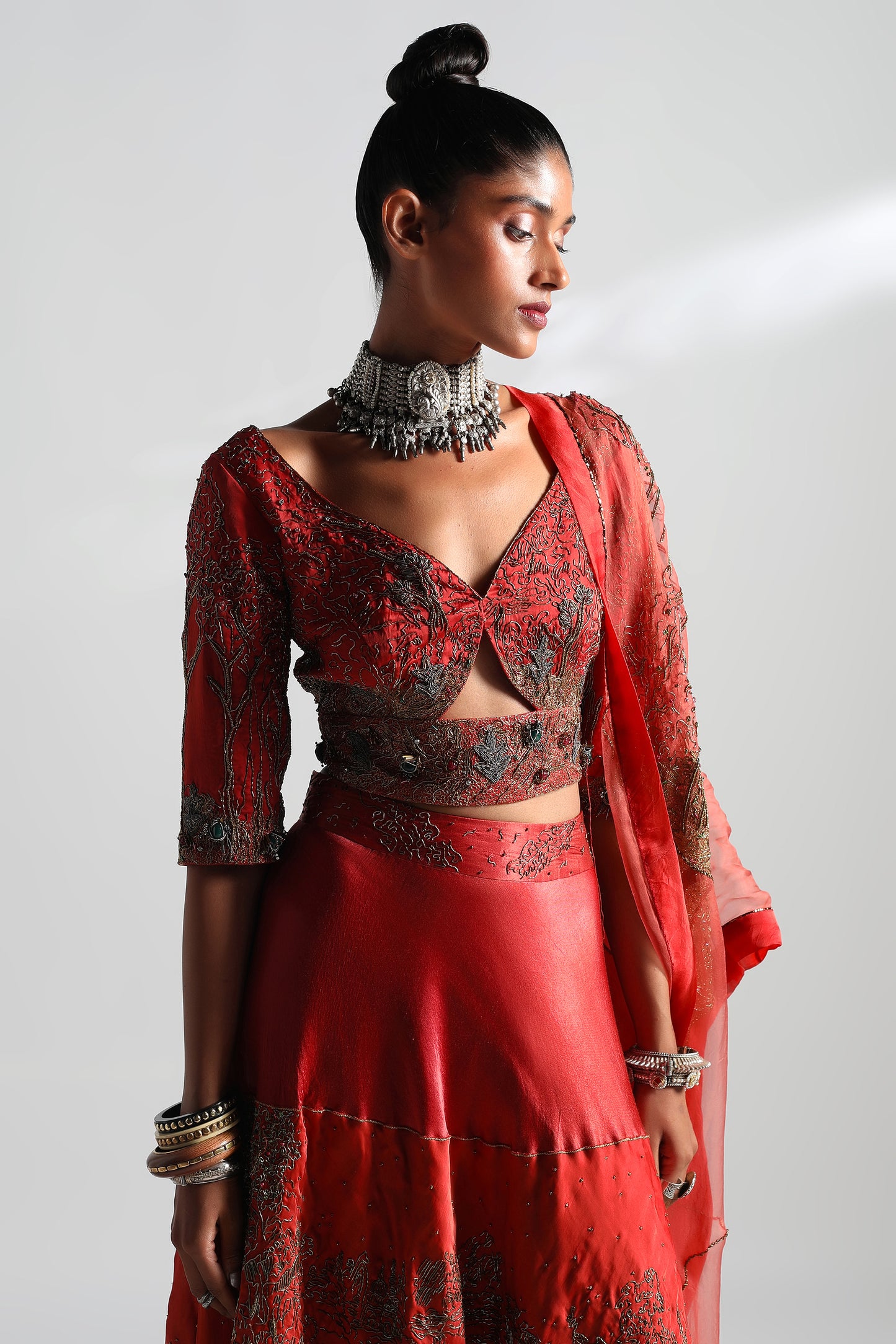 Close-up of the hand-embroidered zardozi and threadwork on the lehenga and cutout blouse of the Valdivian Set