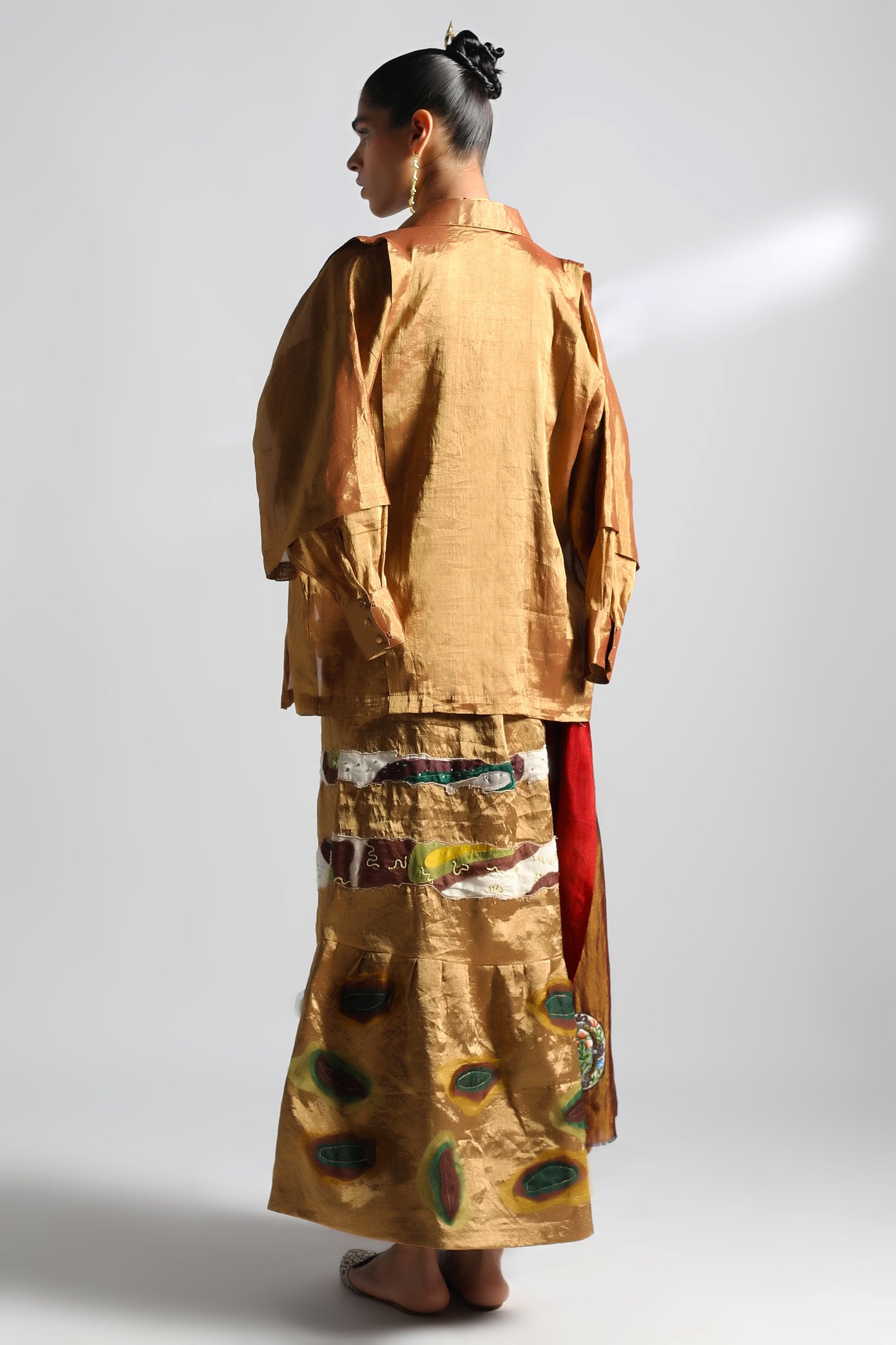 Back view of the Lehenga Set showing the stylish shirt and the elegant fit of the skirt