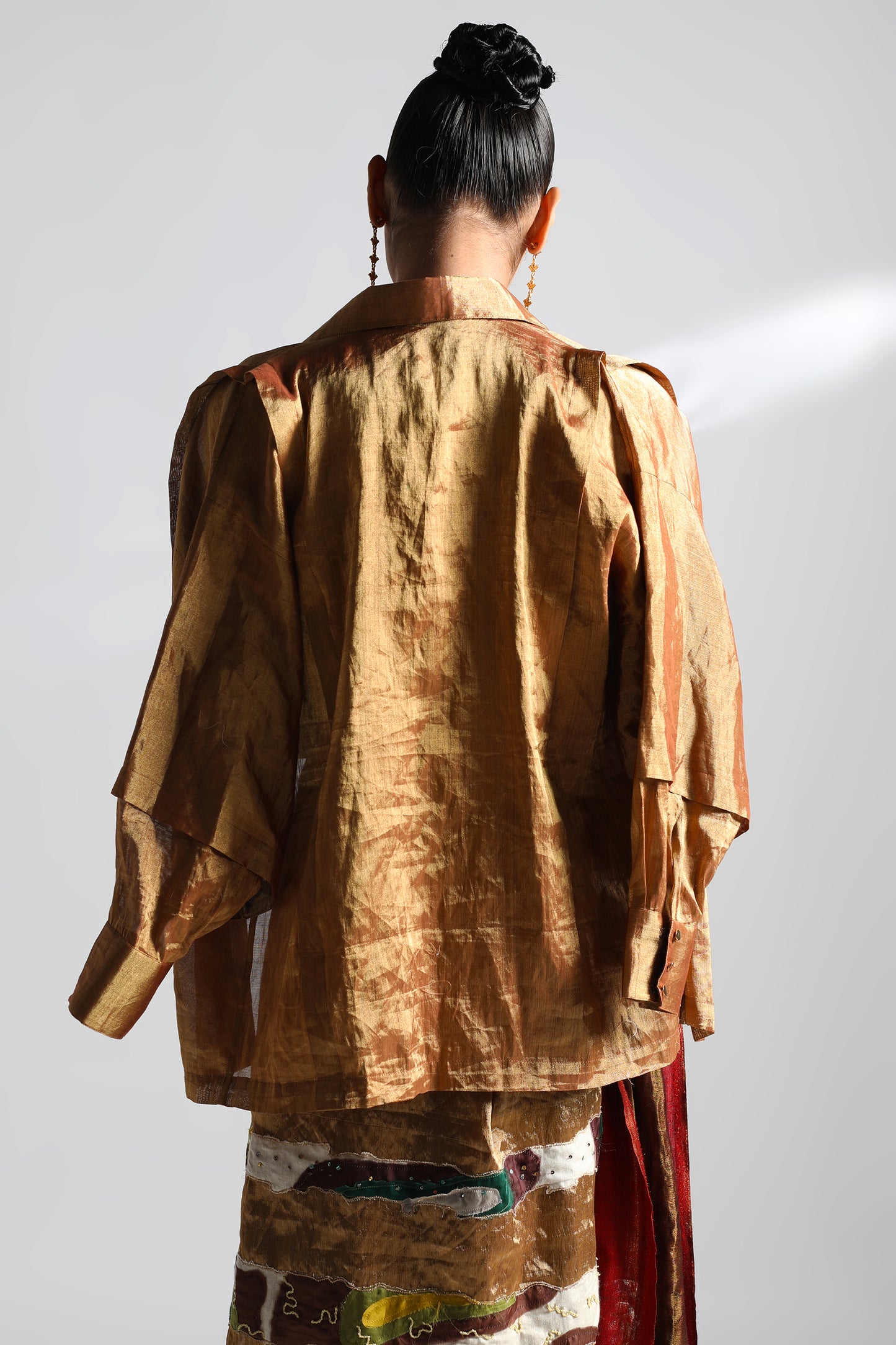 Back view of the Exquisite Lehenga Set, highlighting the stylish shirt and the elegant fit of the modern blouse and skirt