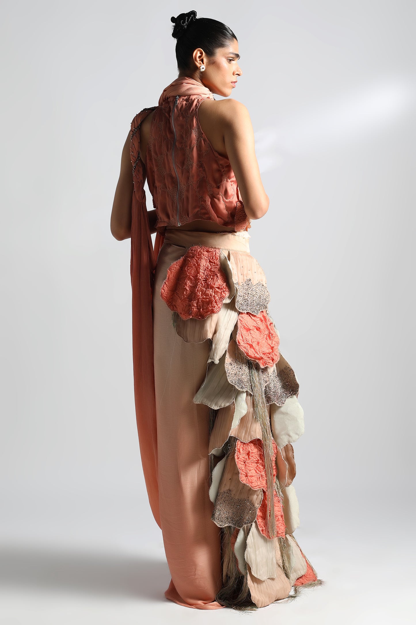 Back view of top saree set with belted saree blouse showcasing handwork