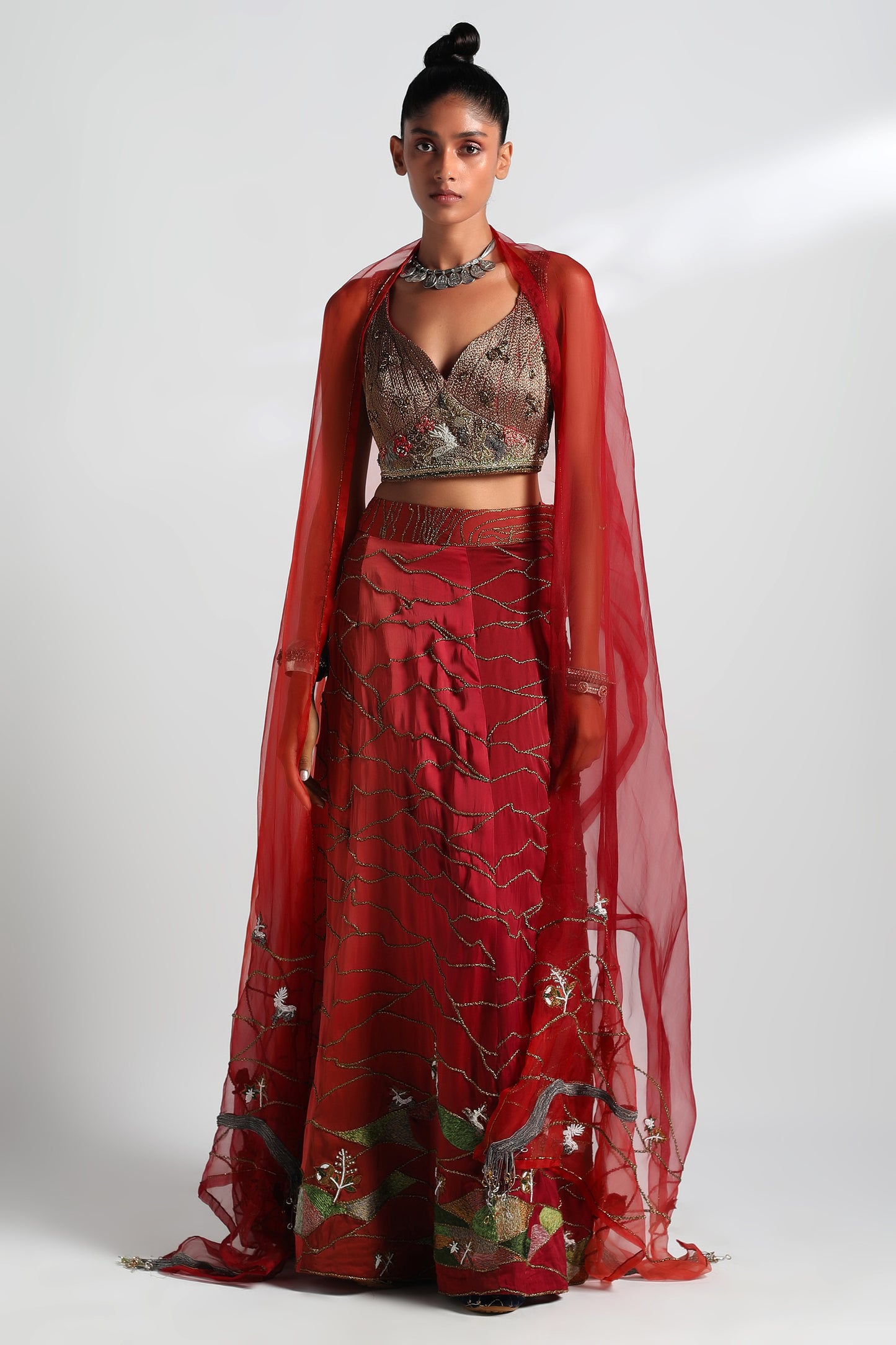 Valdivian crimson lehenga set with embroidered corset blouse, organza dupatta, and zardosi details