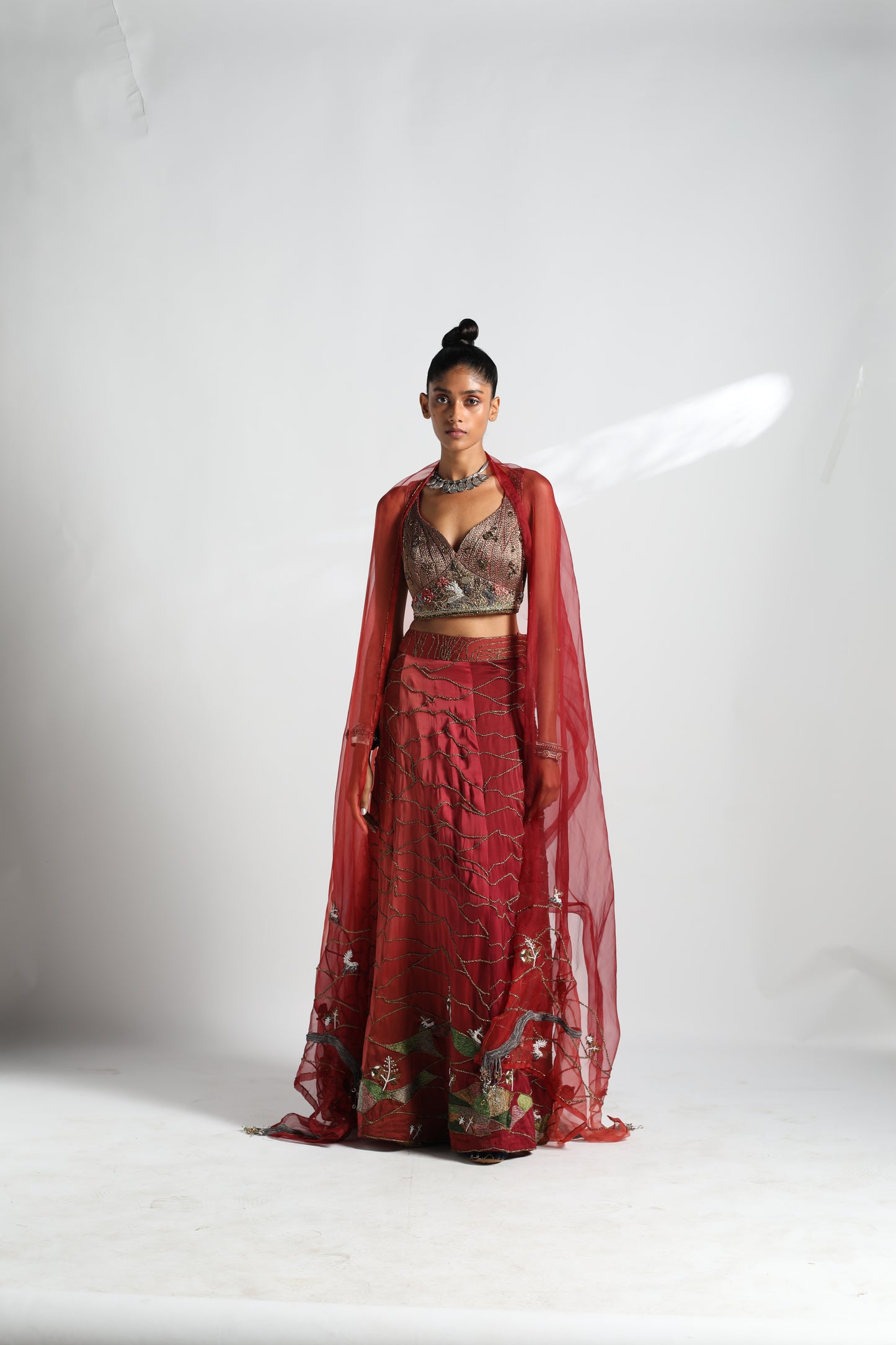 Namib lehenga and dupatta set with metallic blouse, hand embroidery, and beadwork