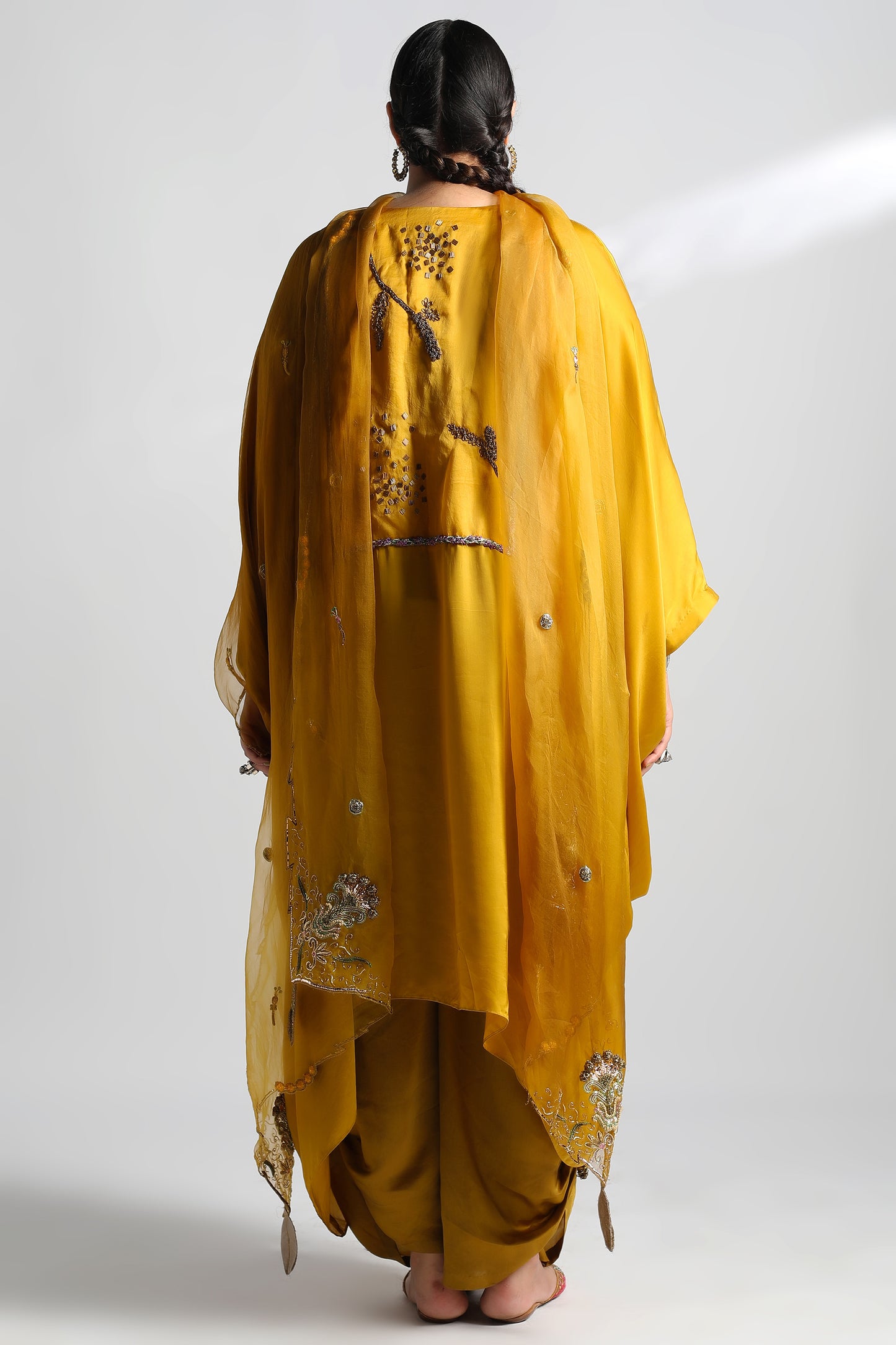 Back view of kurta dhoti set for women showing detailed Paro dupatta and kurta