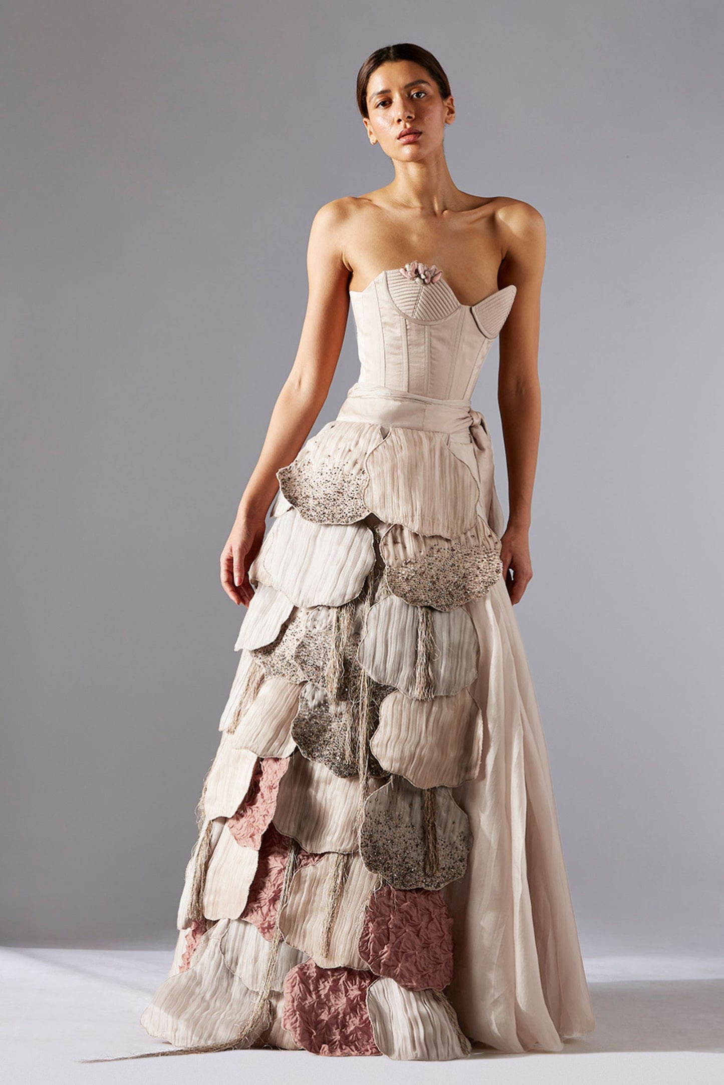 Luxury pleated skirt with a quilted corset and fungi-inspired laurel designer belt for women