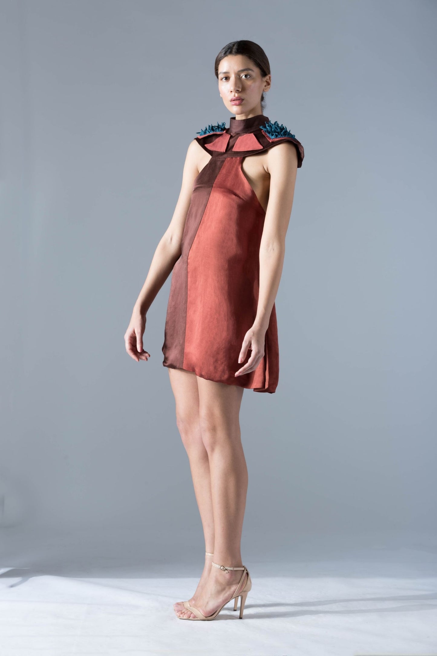 Full view of the modern designer shoulder tent dress, highlighting the elegant, modest silhouette and luxurious design