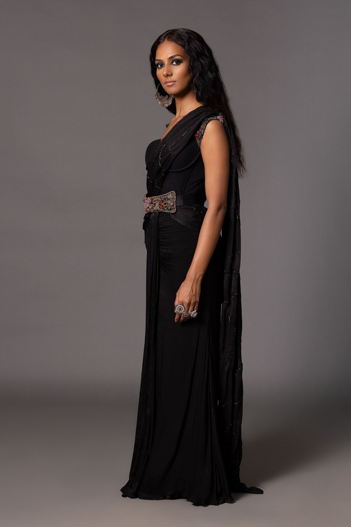Side View of Kalbeliya Black Corset Sari, Featuring Beaded Sleeves and Stylish Belt
