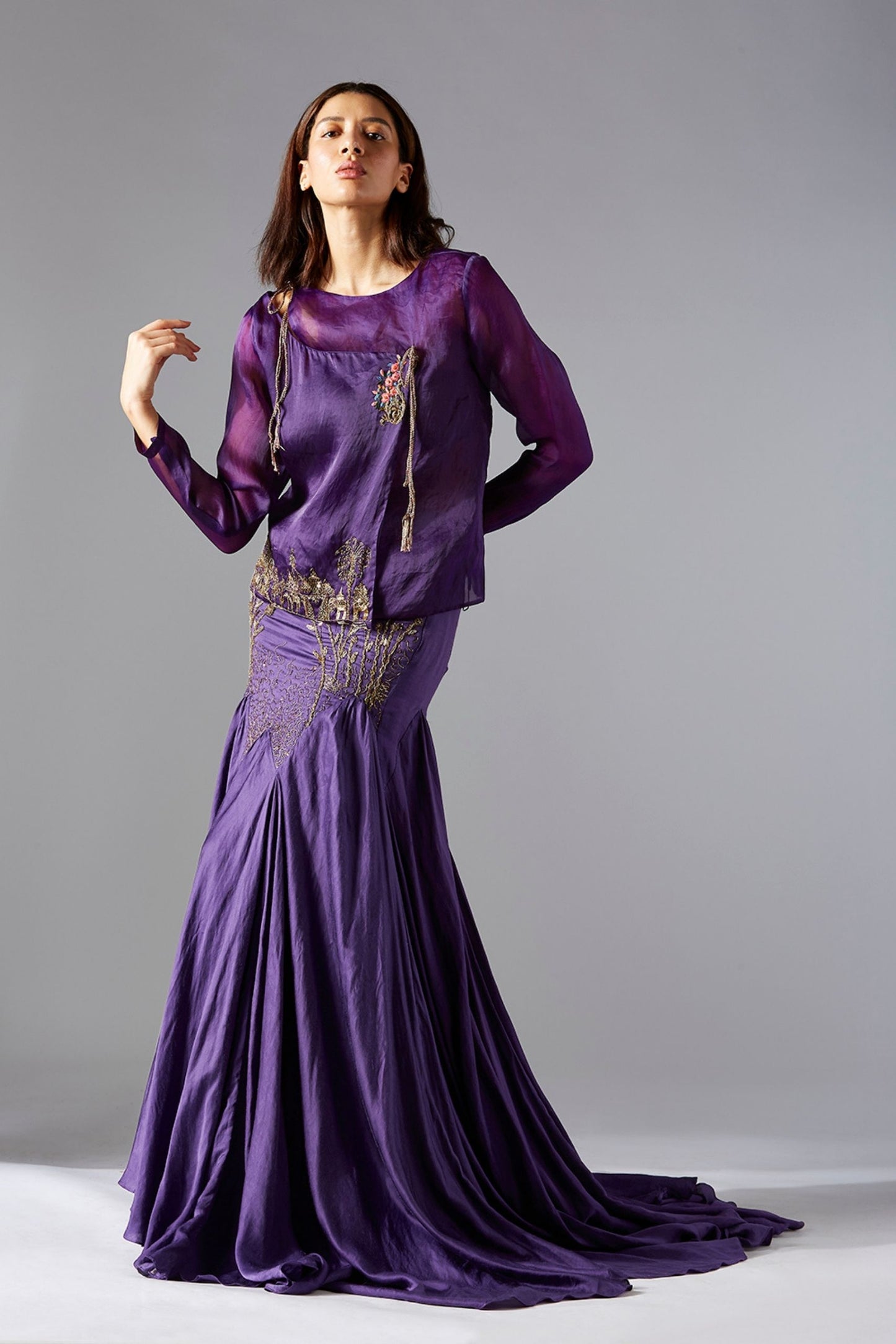 Stylish top skirt set for women with corset-style top and abstract embroidery, paired with a flared batik skirt