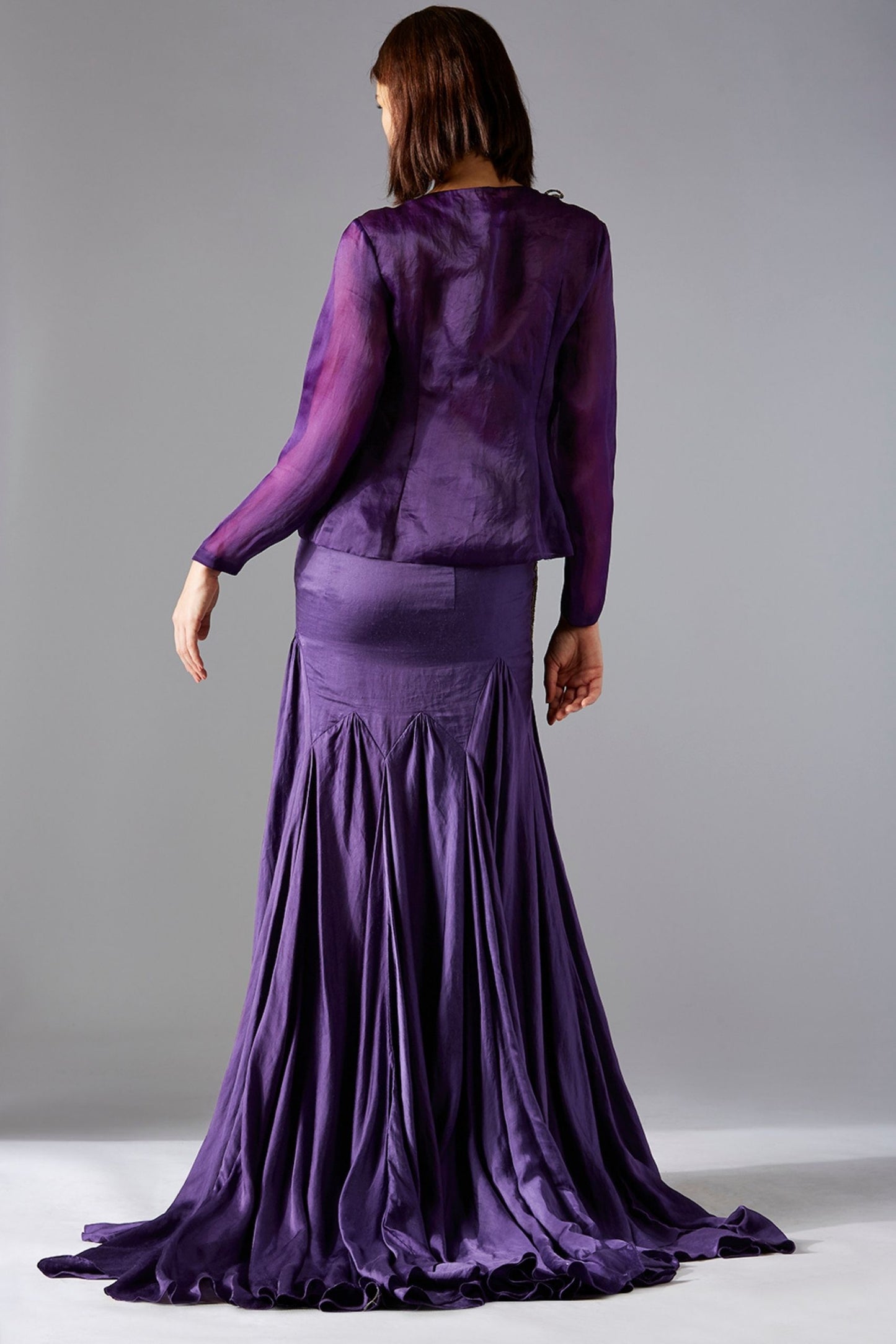Back view of the stylish top skirt set, highlighting the elegant design and fit of the corset-style top and batik skirt