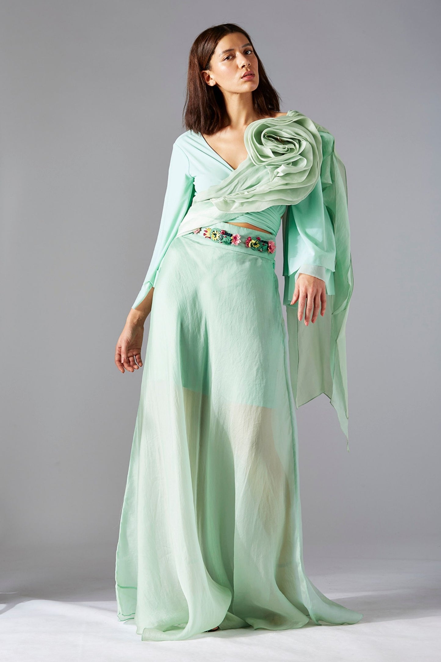 Elegant blouse and skirt dress with floral embroidery and a rose stole, perfect for special occasions with a timeless design