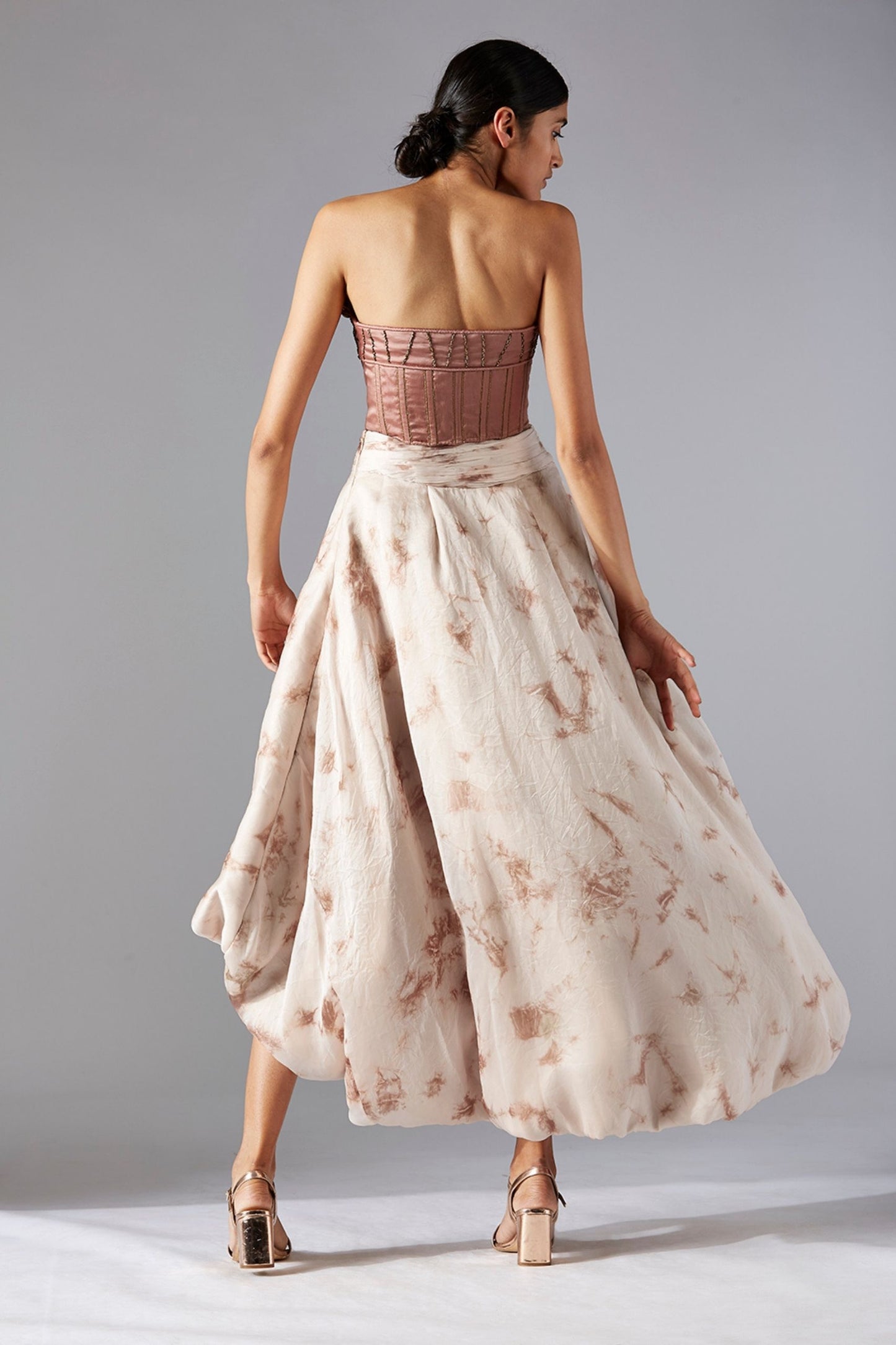 Back view of the Maze Scrawled top & modern skirt set, showcasing the elegant design and perfect fit