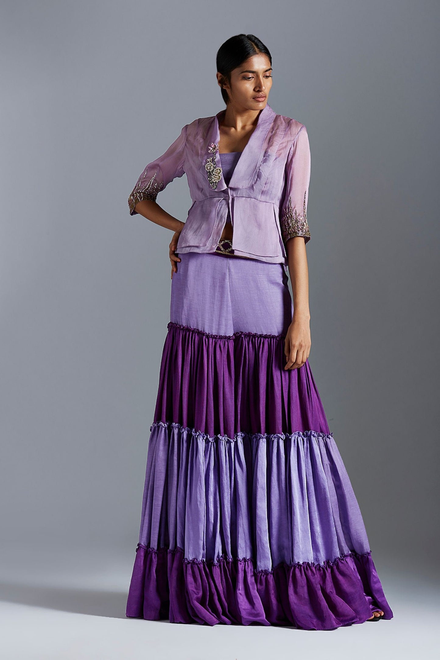 Designer blouse and sharara dress with pleated blouse and lotus-inspired embroidery, featuring two-tone hues for a stylish ensemble