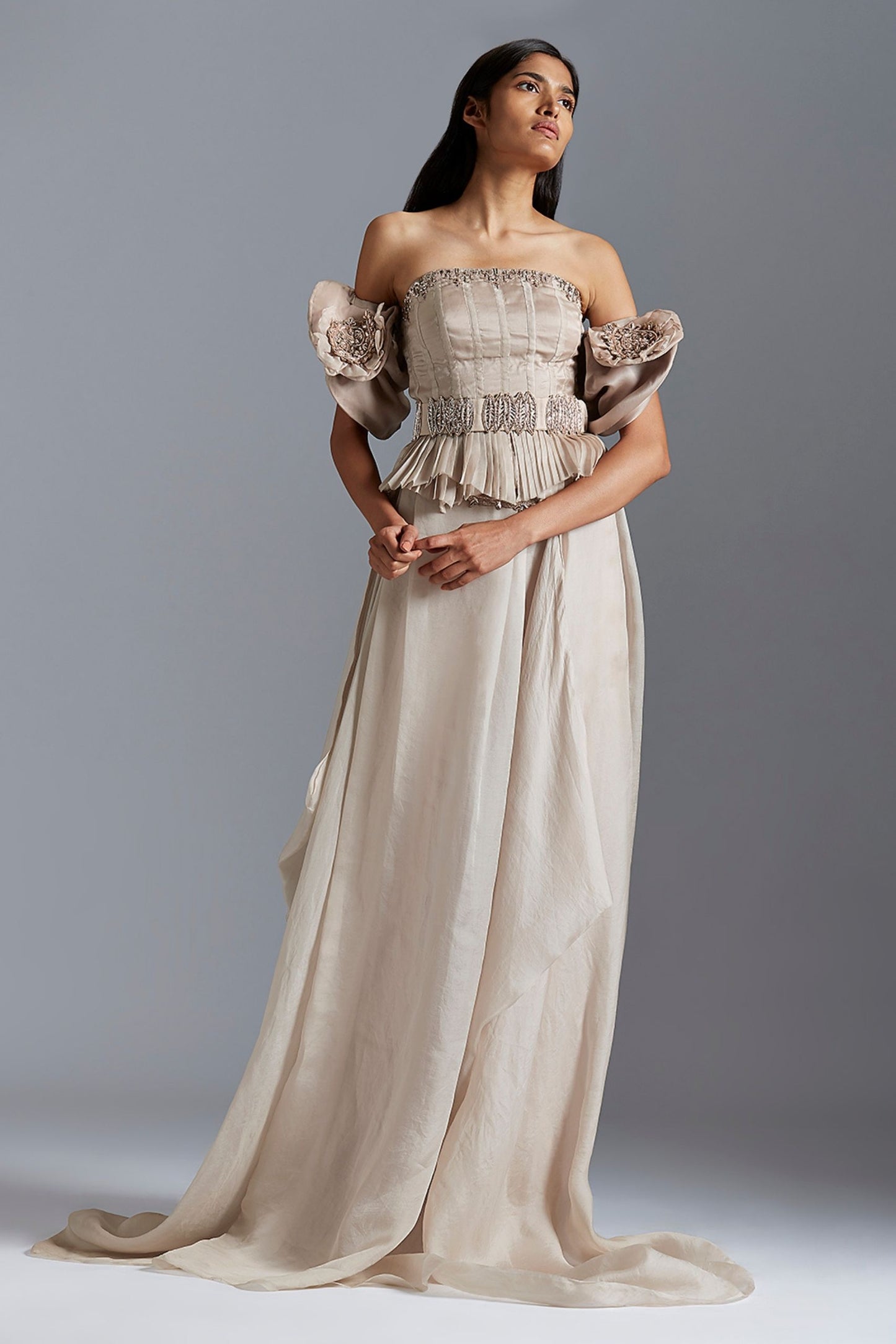 Elegant corset top and skirt set with intricate Mukaish handwork, featuring a flattering fit & flare silhouette, perfect for special occasions