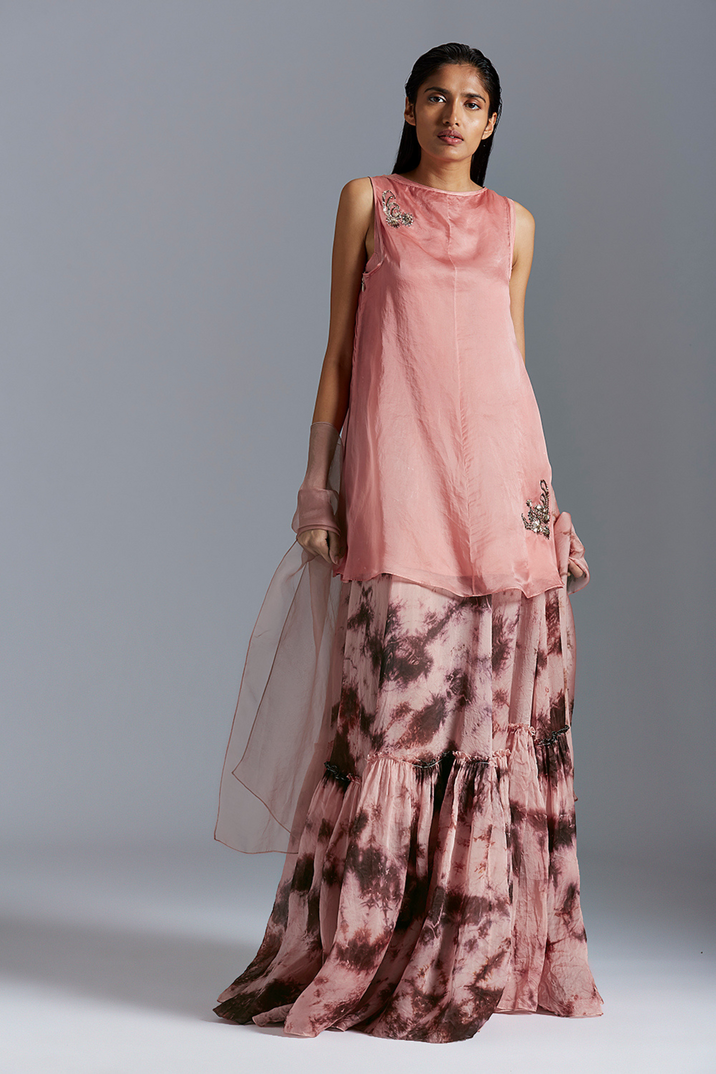 Flamingo skirt suit with dupatta featuring hand-dyed batik and mukaish work in elegant satin organza fabric