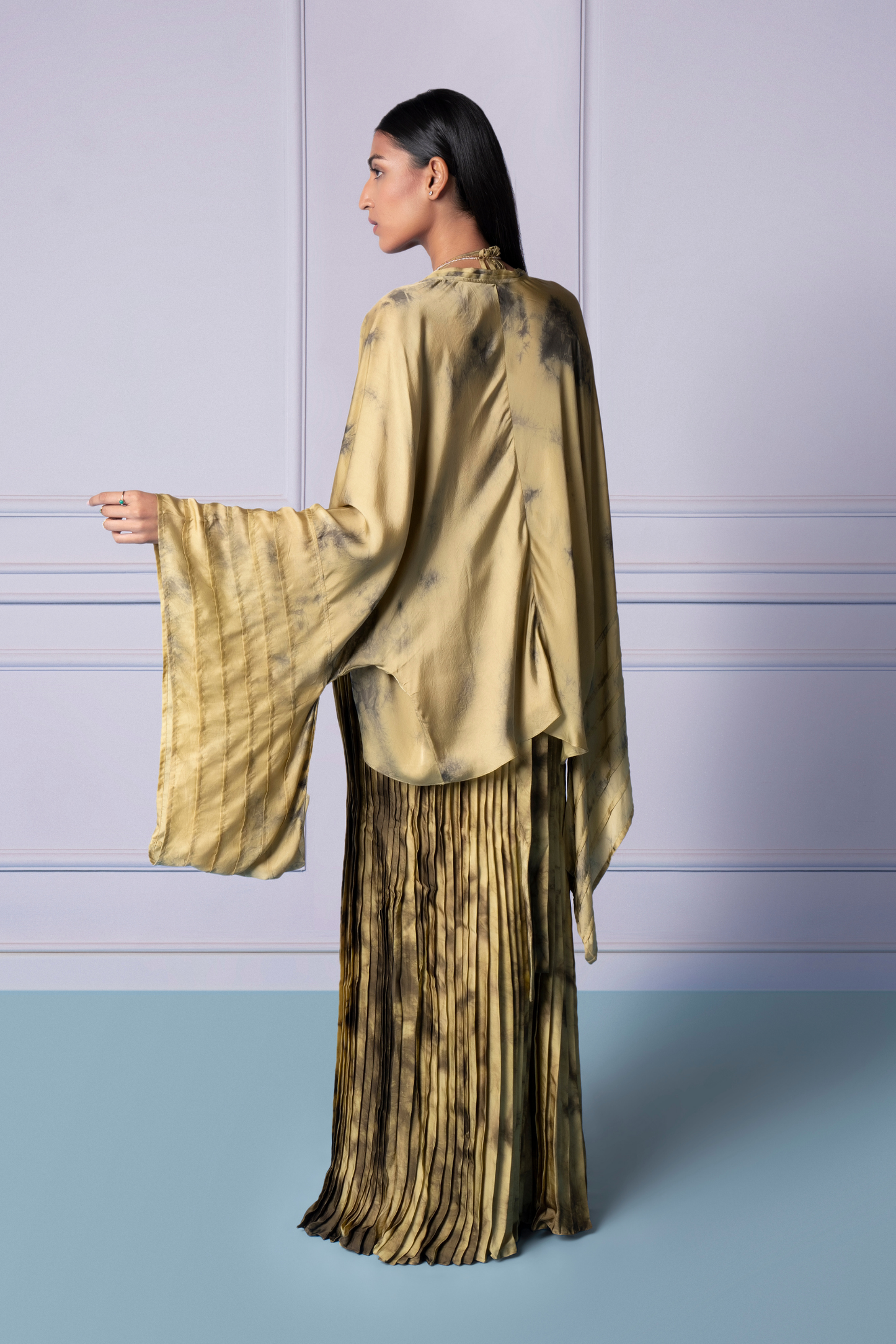 Back view of Marshscape bralette and skirt set with shrug