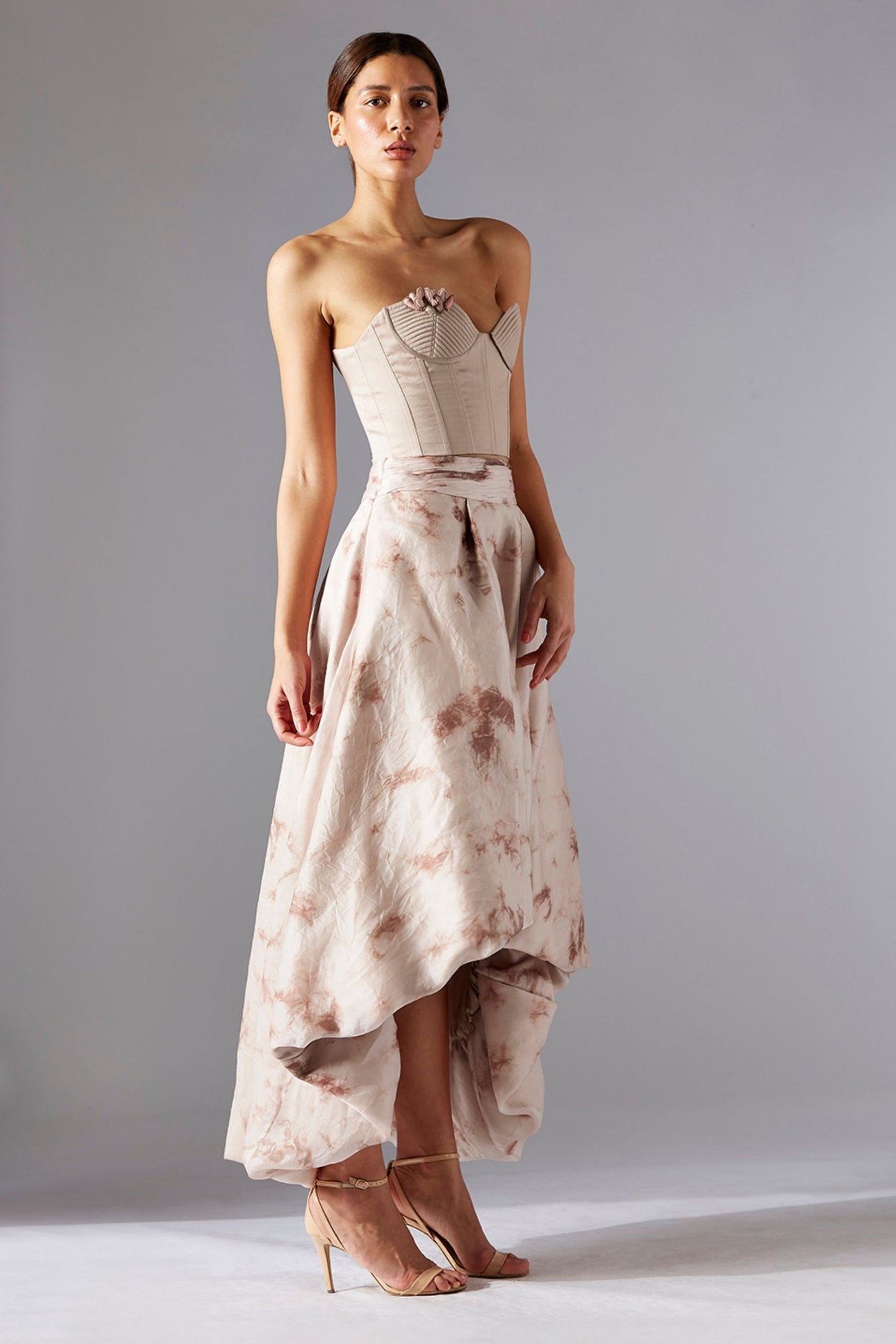 Nargis corset & skirt set featuring handmade dori work and a flared batik skirt, offering an elegant and stunning corset and skirt combination