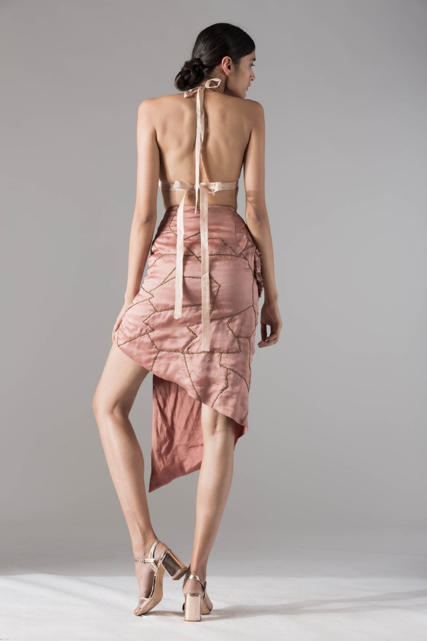 Back view of the Maze Scrawled skirt and jacket set, showcasing the chic design and flattering fit