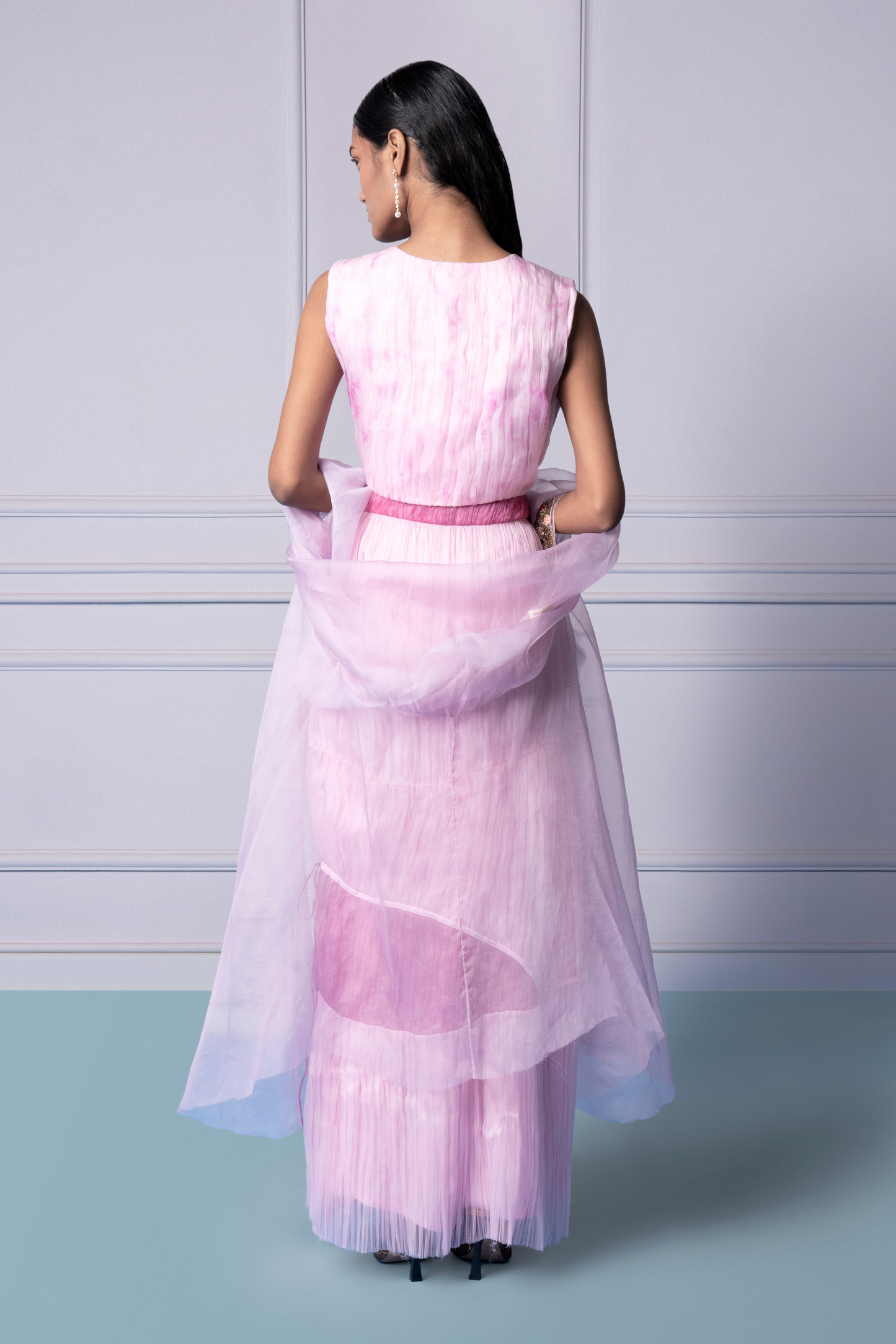 Back view of the Carnation lehenga set, showing the intricate mukaish work and detailed design of the lehenga