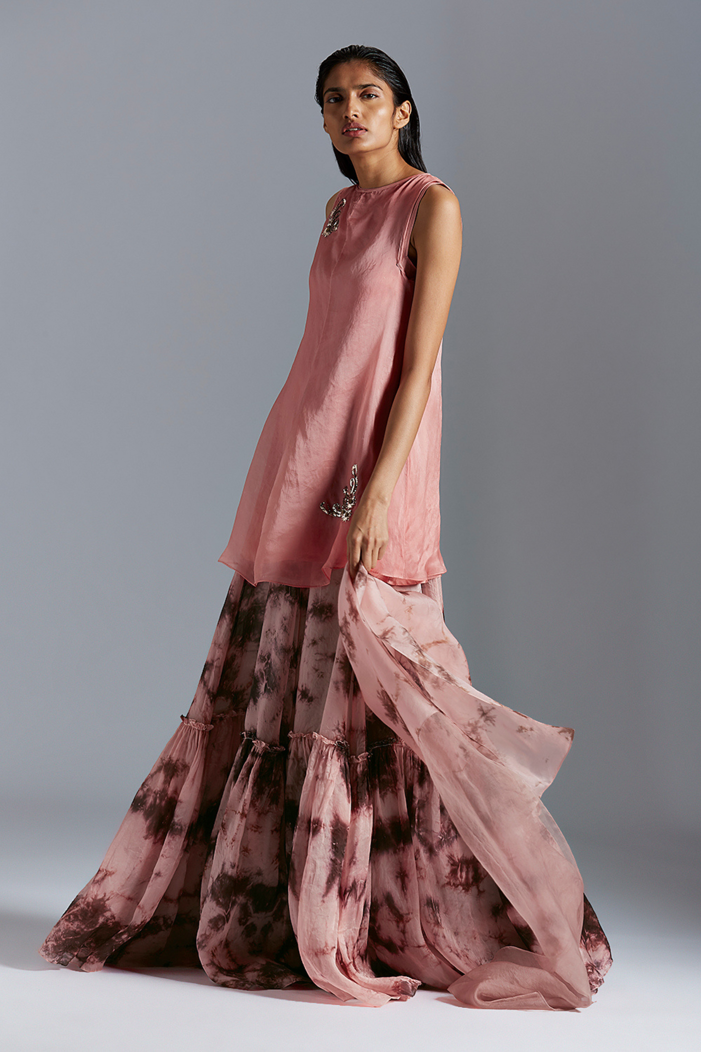 Flamingo skirt suit with dupatta featuring hand-dyed batik and mukaish work in satin organza fabric