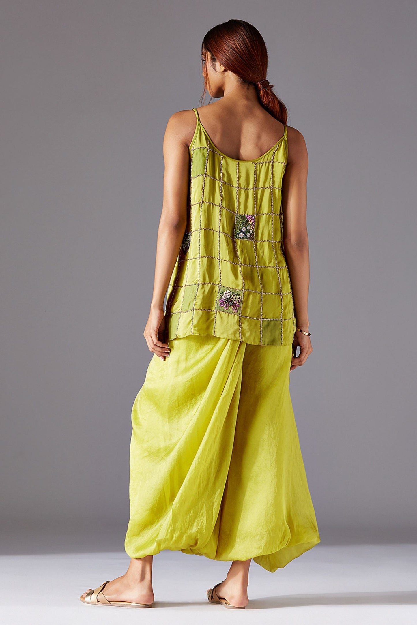 Back view of the designer spaghetti top and pants set, highlighting the tailored fit and stylish design