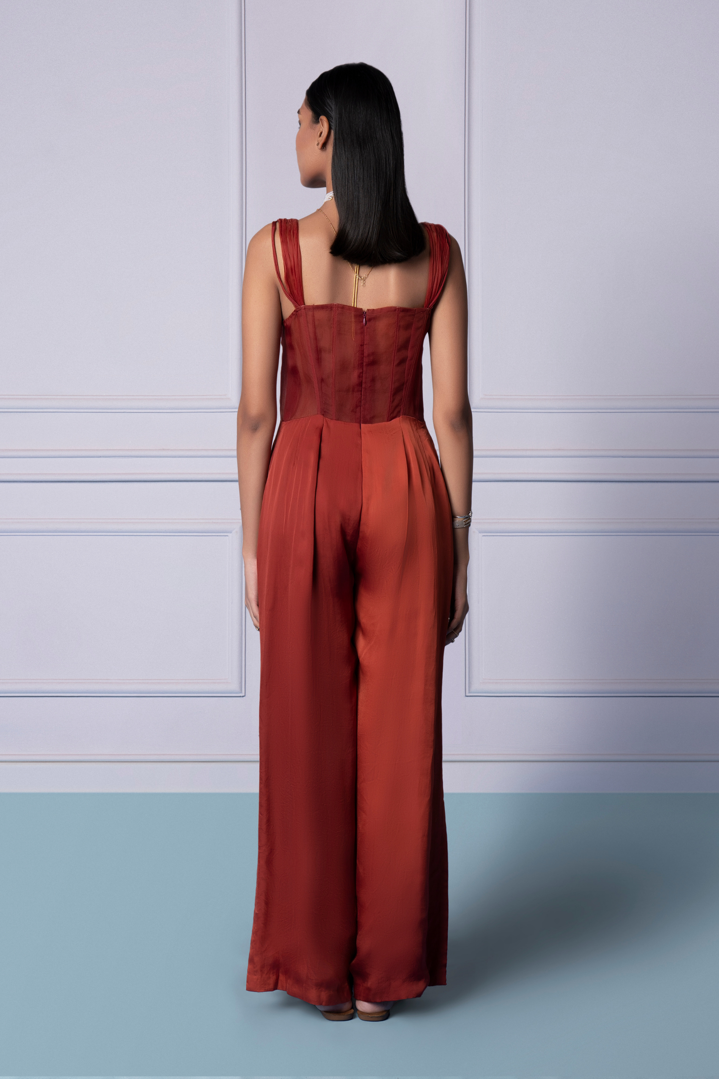 Back view of Namib jumpsuit highlighting the sheer corset design