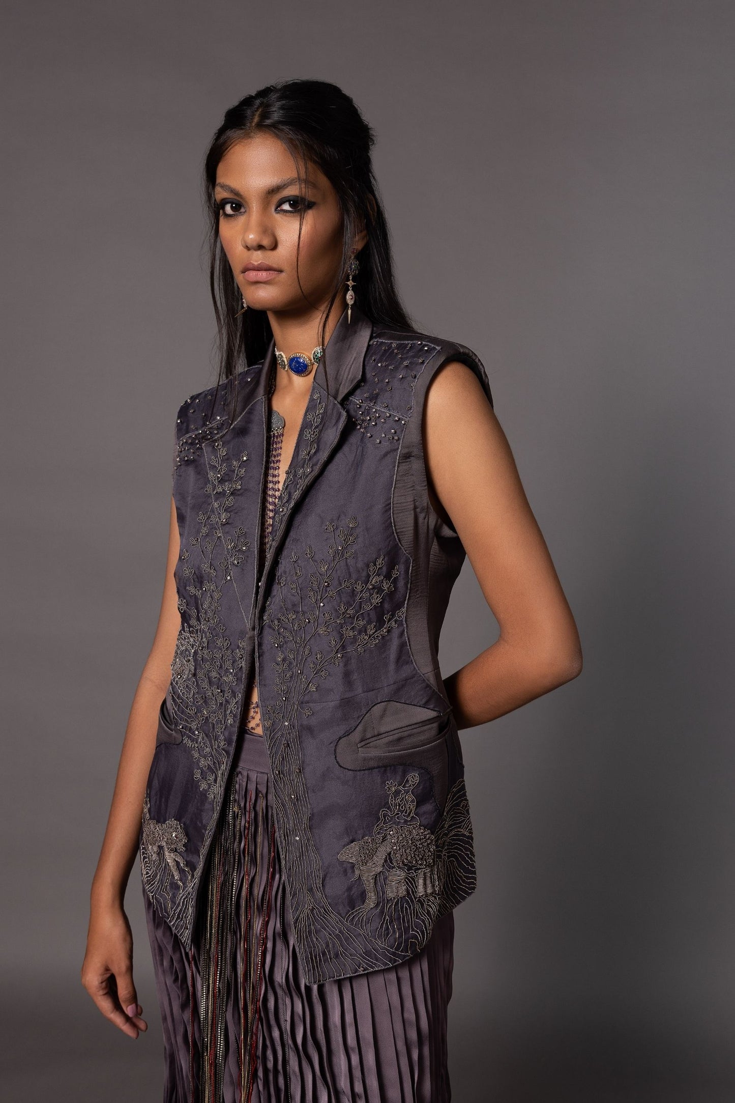 Shikhar Baugh Embroidered Jacket with Jaipur motifs, paired with a hand-pleated skirt for a unique, custom women's outfit