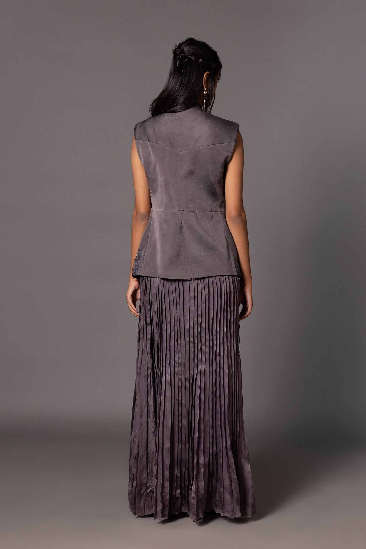 Back view of the Shikhar Baugh Embroidered Jacket with hand-pleated skirt, emphasizing the overall look and fit