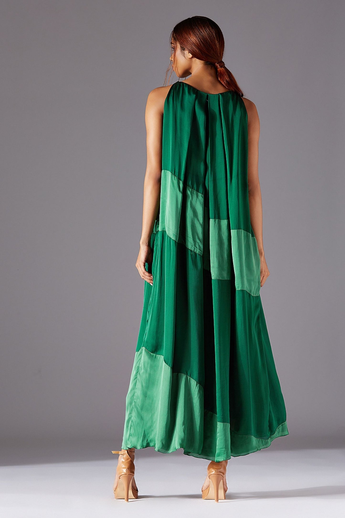 Back view of the dress, displaying the seamless tailoring and design continuity of the stylish dress for women