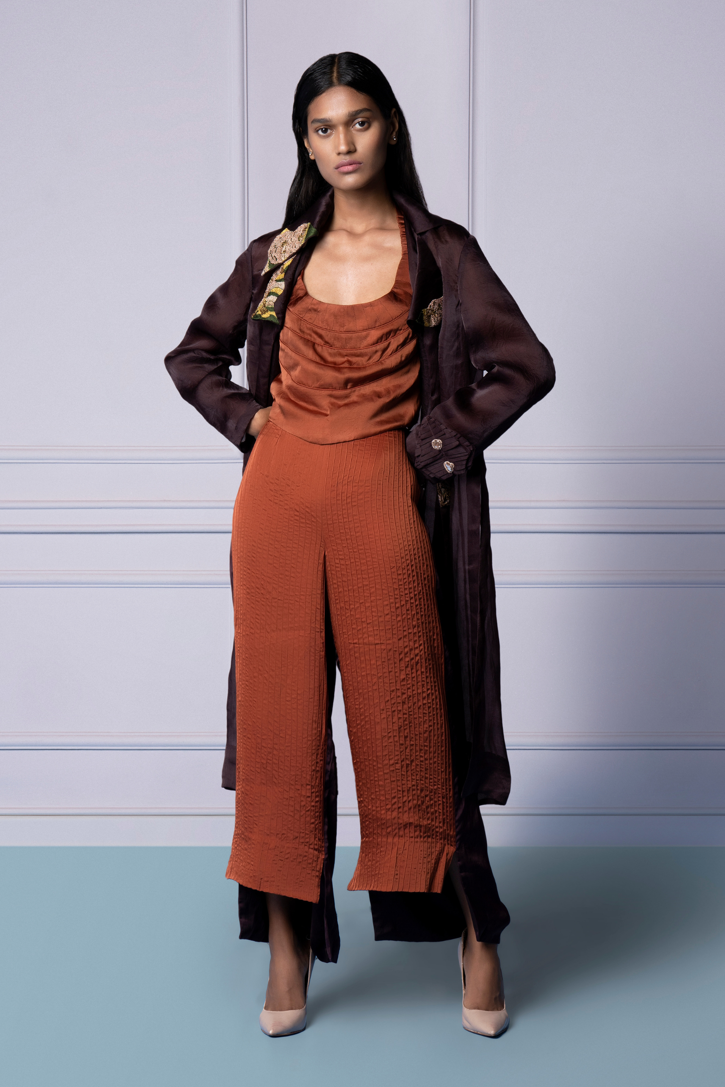 Model wearing the Carpet Jacket Set, exuding modern elegance with a hand-embroidered jacket and corset top, perfect for stylish occasions