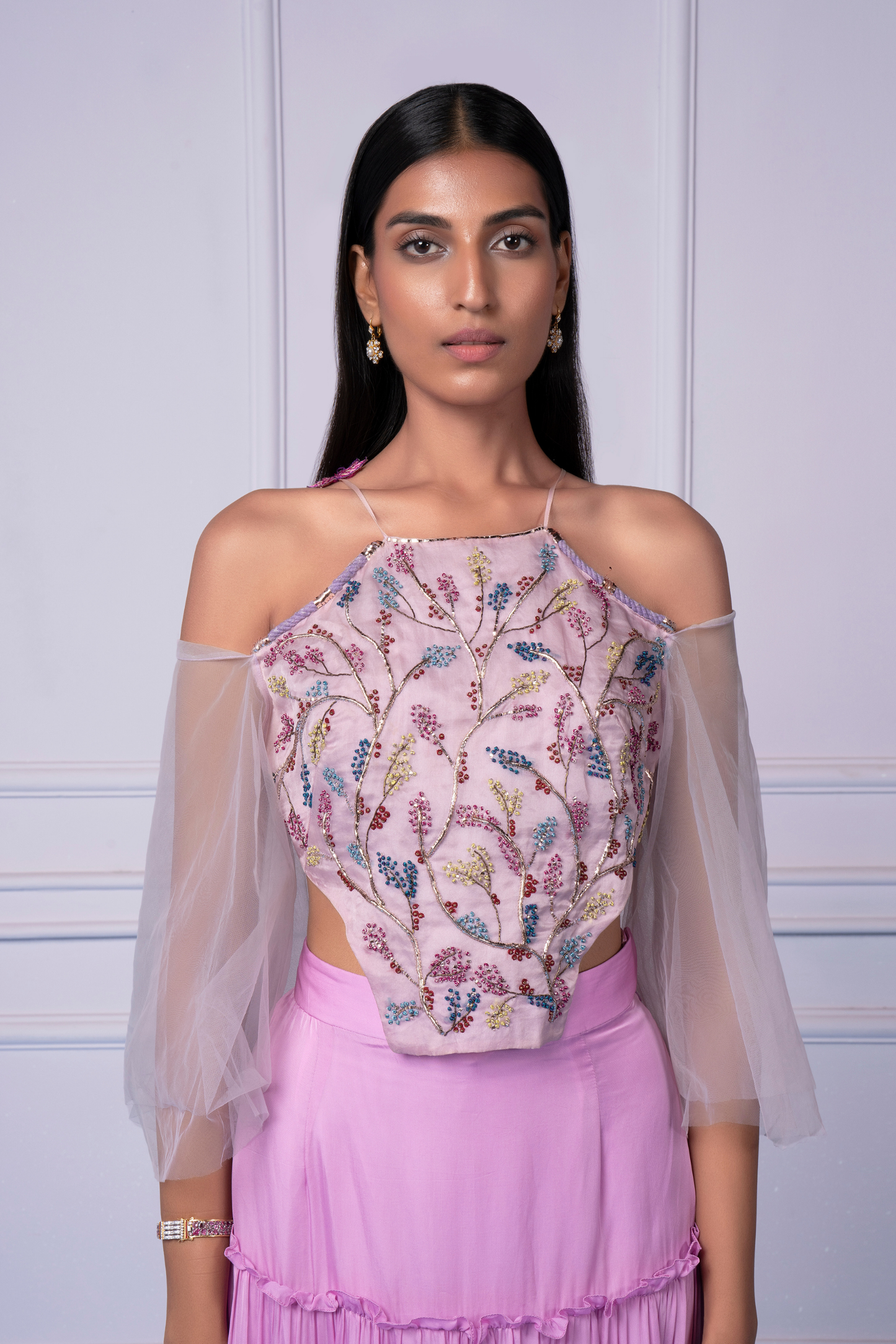 Close-up view of the floral embroidery on the Eden lehenga set, showcasing intricate design details and fine craftsmanship