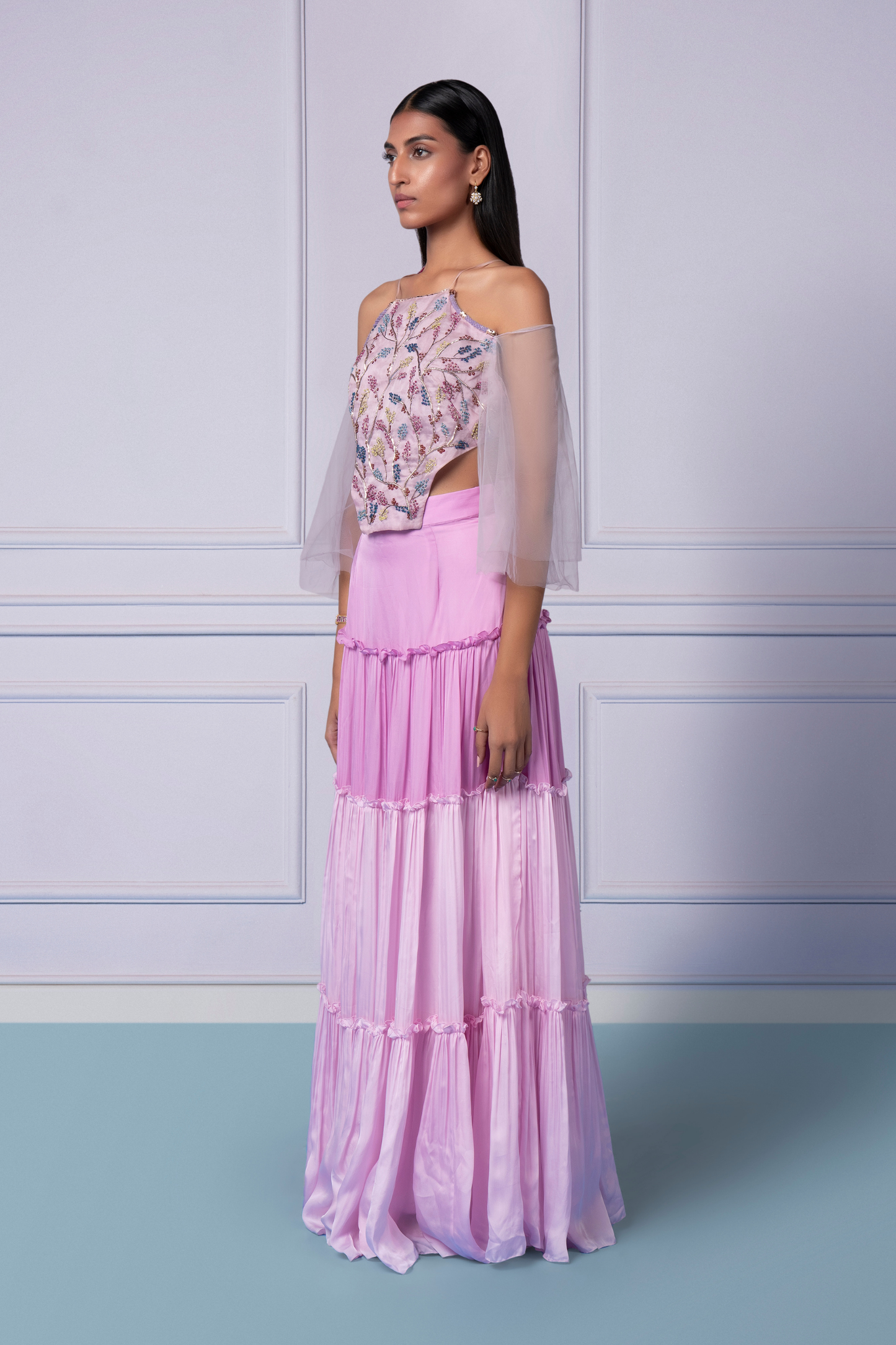 Side view of the Eden lehenga set, emphasizing the flattering fit and flow of the tiered skirt