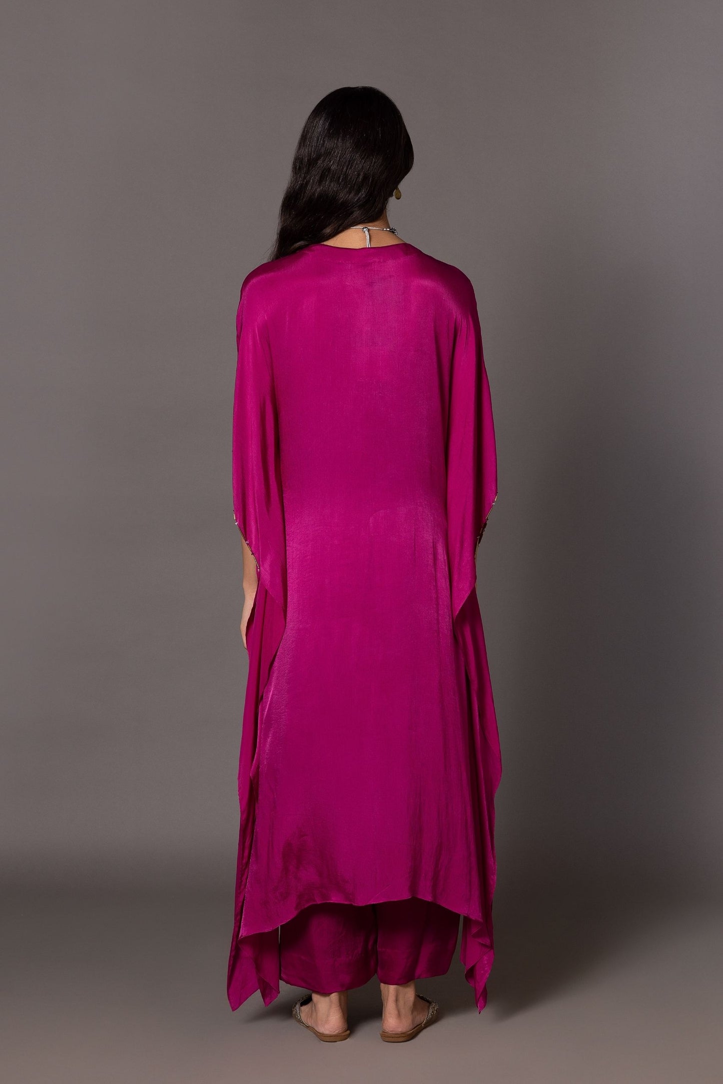 Back view of the Iris Kurta Set, emphasizing the design and fit of the embroidered kurta and trousers
