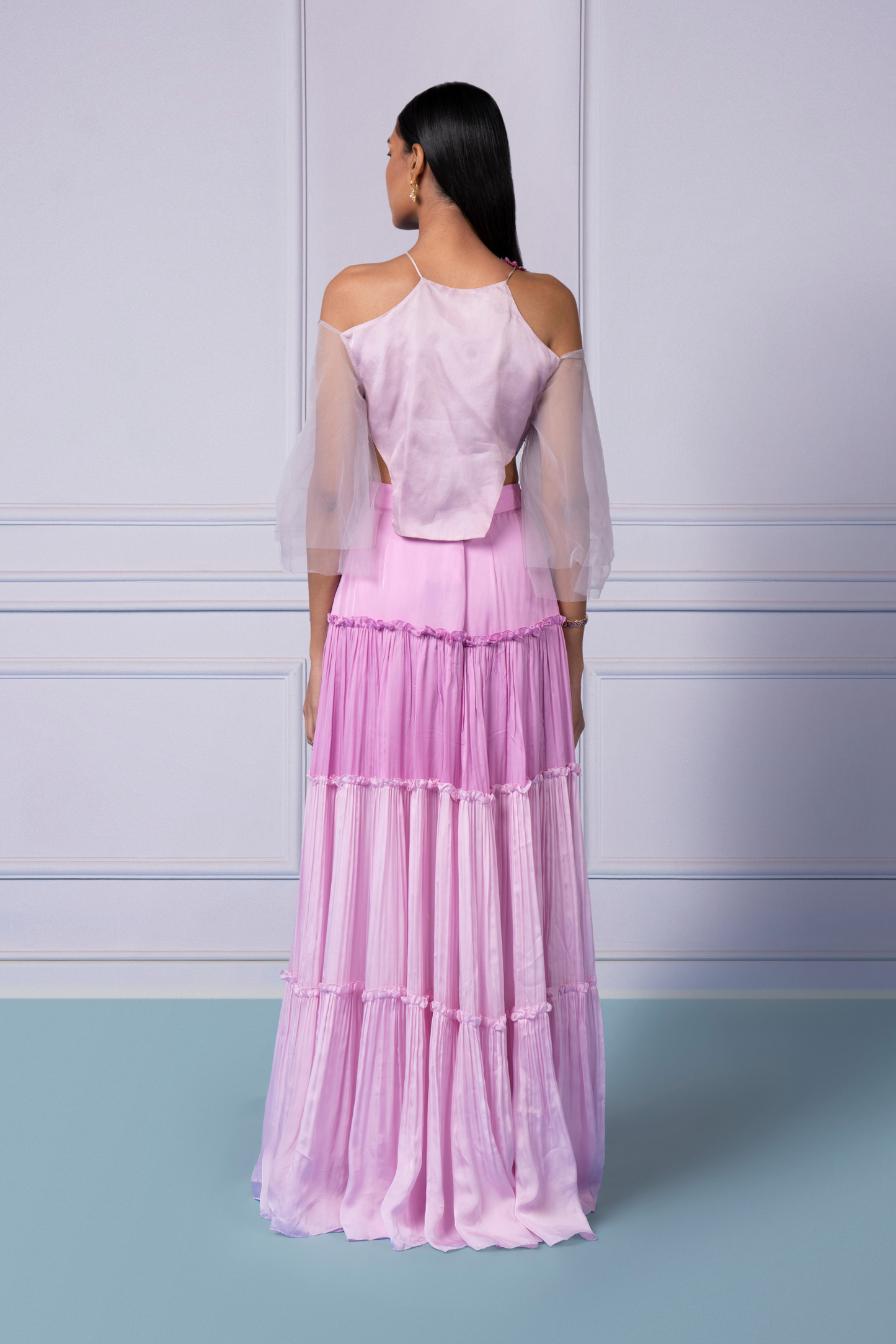 Back view of the Eden lehenga set, showcasing the intricate floral embroidery and detailed design of the skirt