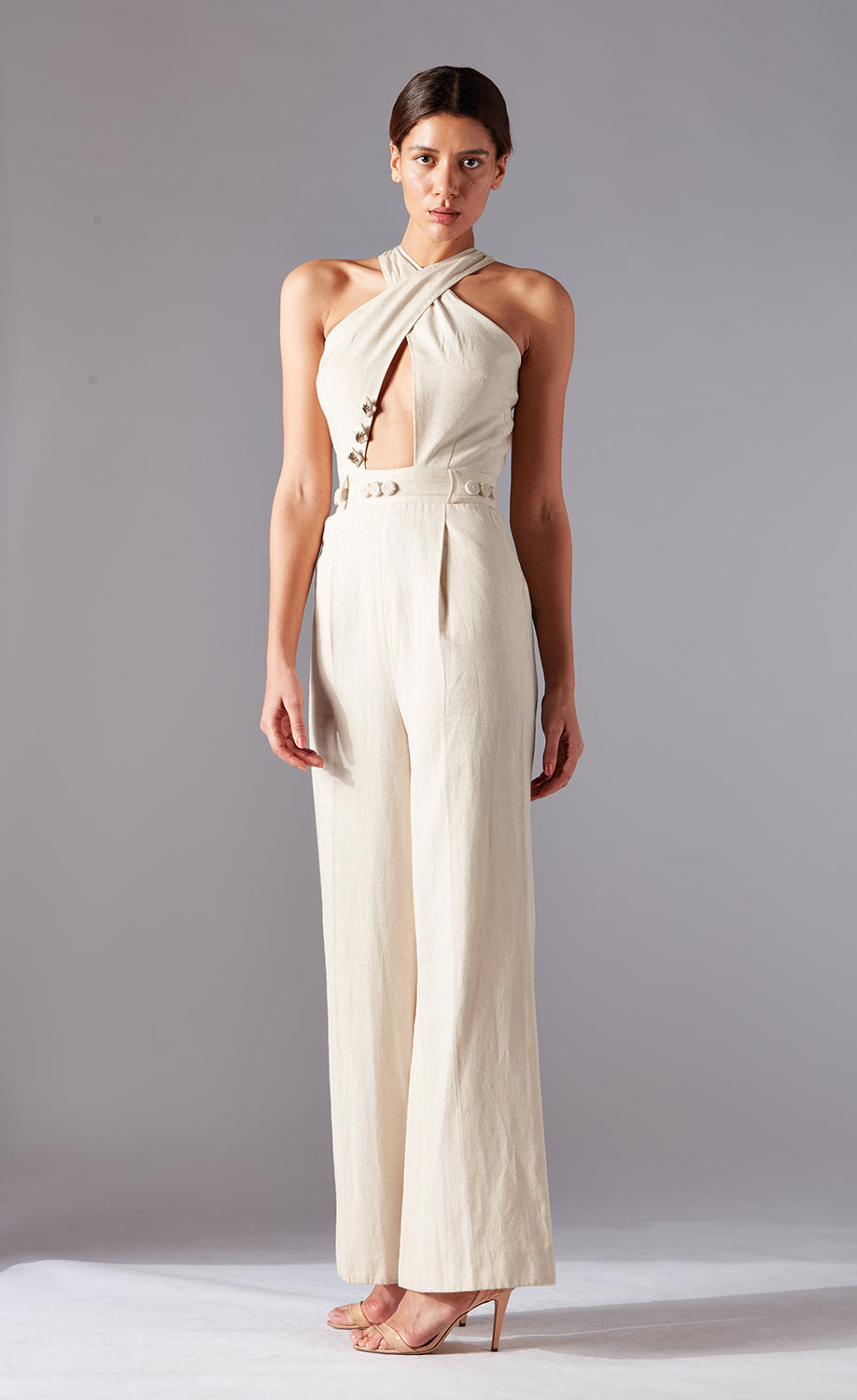 Modern stylish jumpsuit for women in natural khadi with cross-body design and wide-leg fit, offering a chic and contemporary look