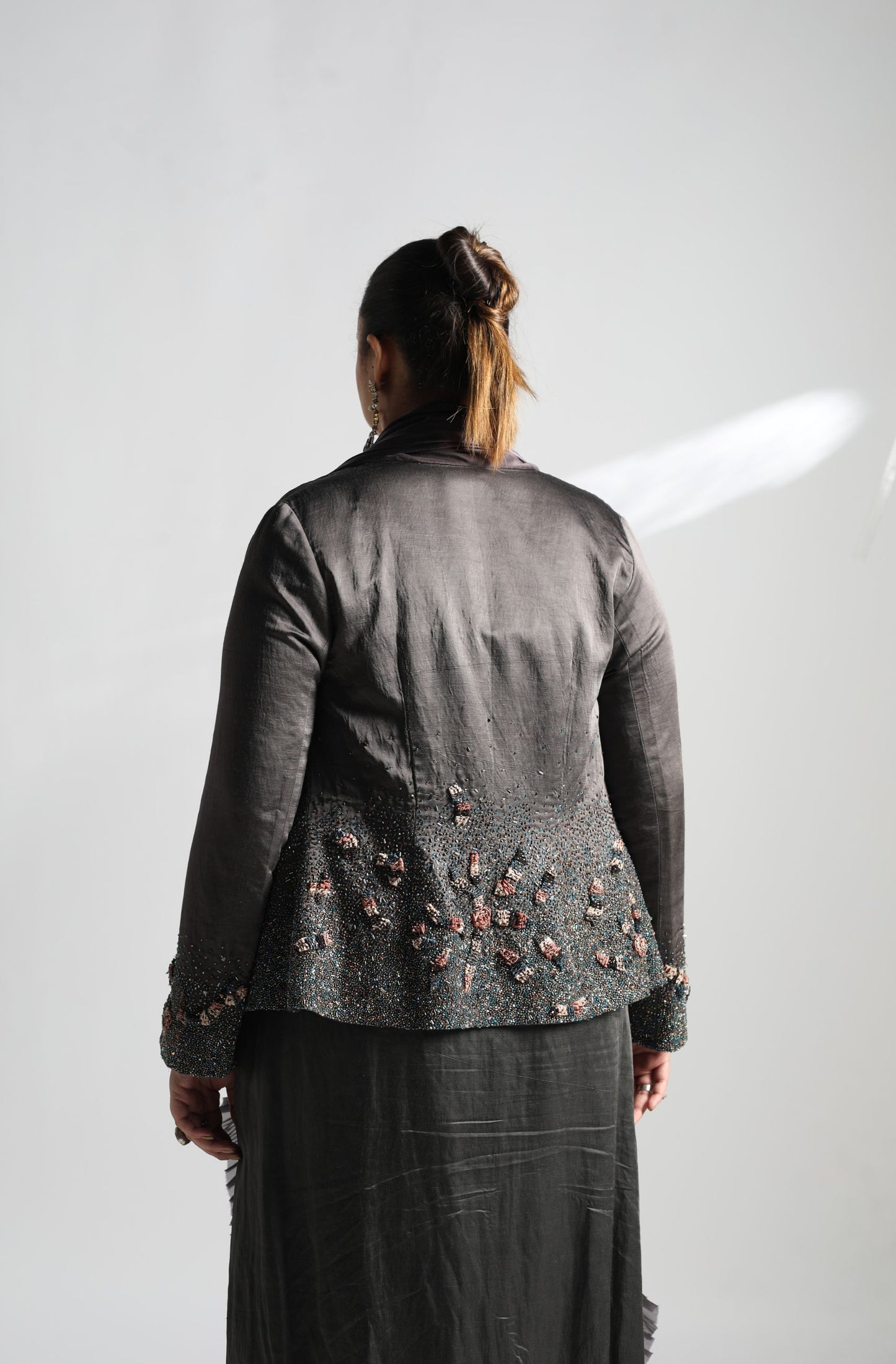 Collared jacket womens back design – Elegant collared jacket for women with detailed embroidery on the back.