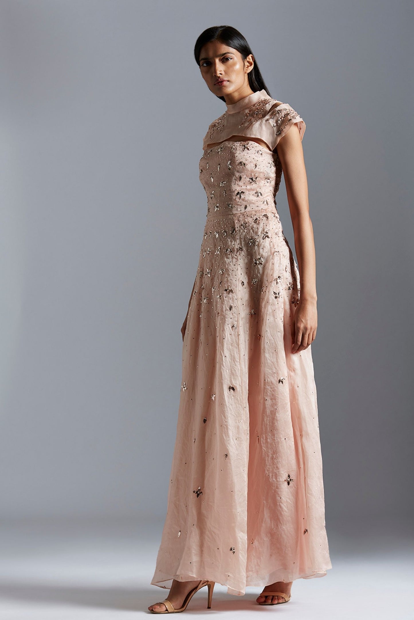 Full-body shot of the modern flared satin organza gown, highlighting the graceful silhouette and elegant flow