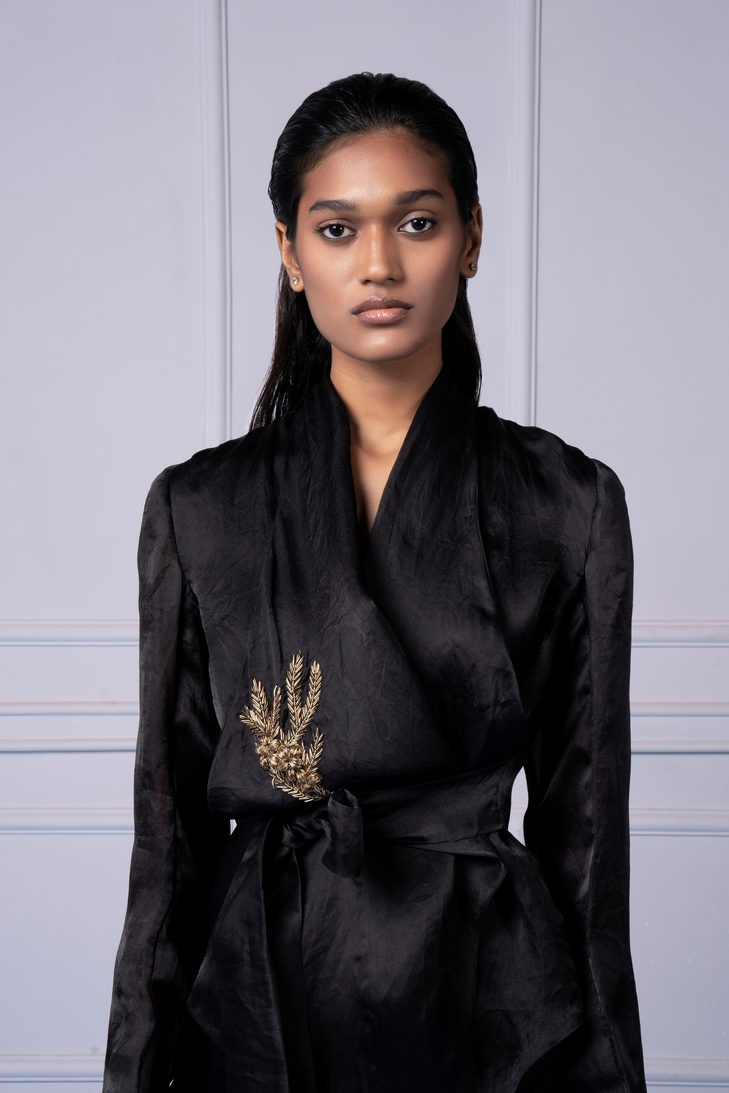 Woman wearing the stylish jacket, offering a chic and fashionable look