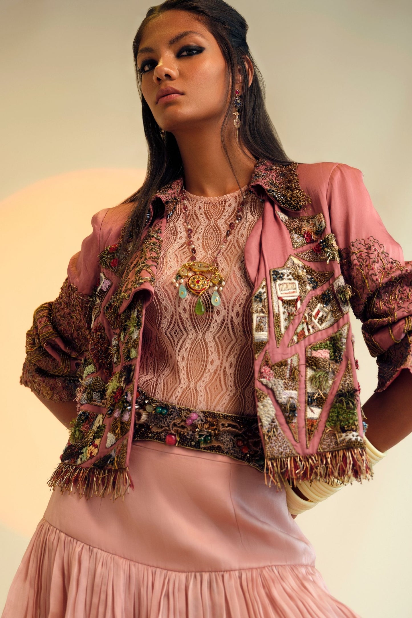 Model Wearing Dusty Pink Skirt and Jacket Set with 3D Metallic Embroidery and Ruched Skirt