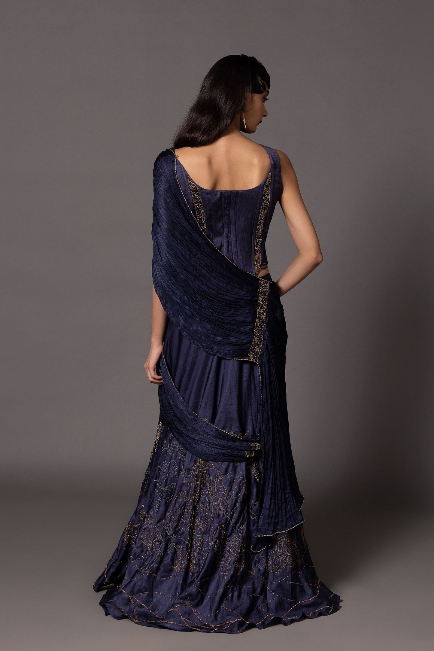 Back view of the Shikharbaugh Navy Blue Lehenga Set showcasing the tailored corset design